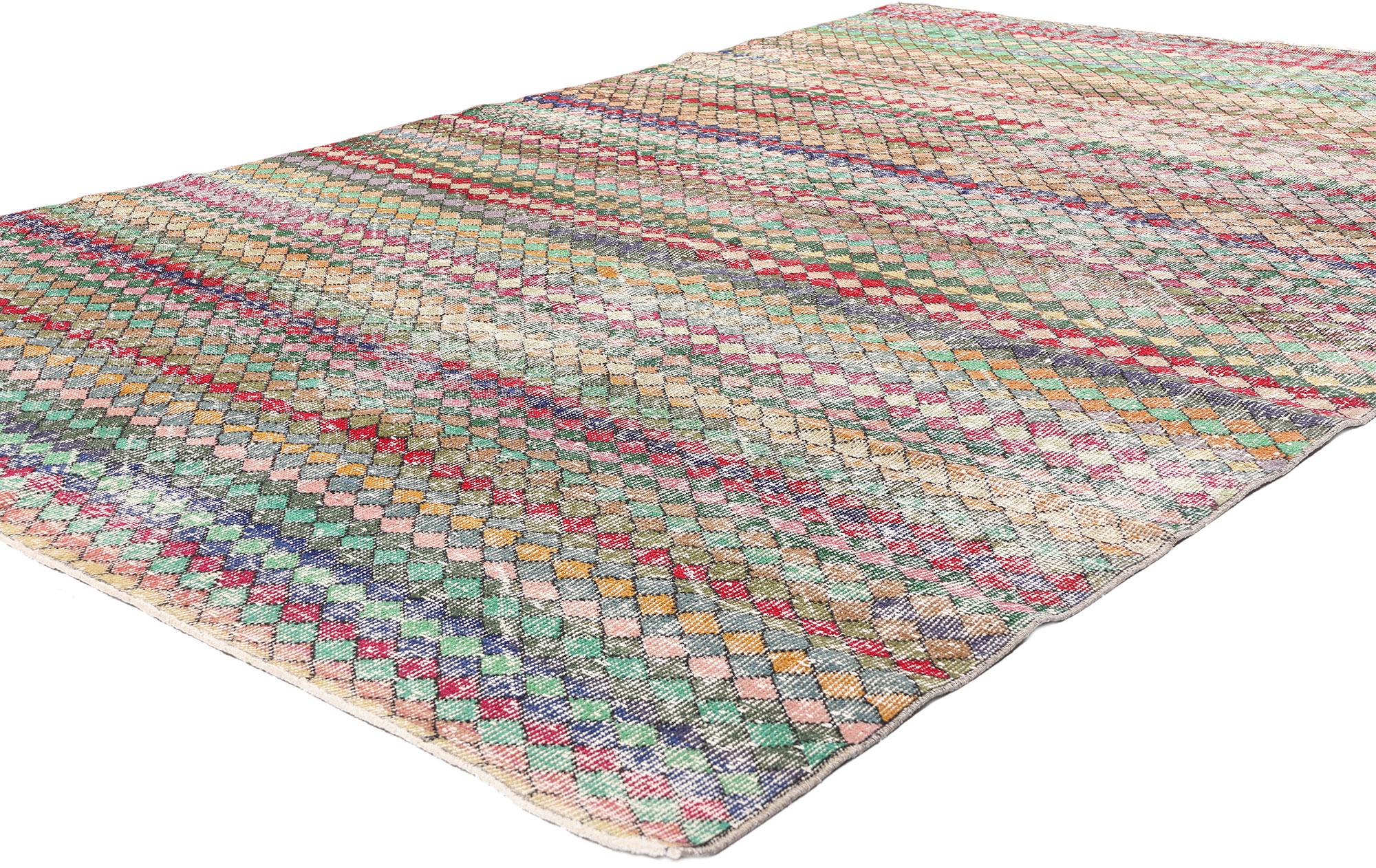 53295 distressed vintage Turkish Sivas rug with rustic Mid-Century Modern style. This hand knotted wool distressed vintage Turkish Sivas rug features an all-over checkerboard pattern comprised of small multicolored diamonds. Gentle waves of abrash