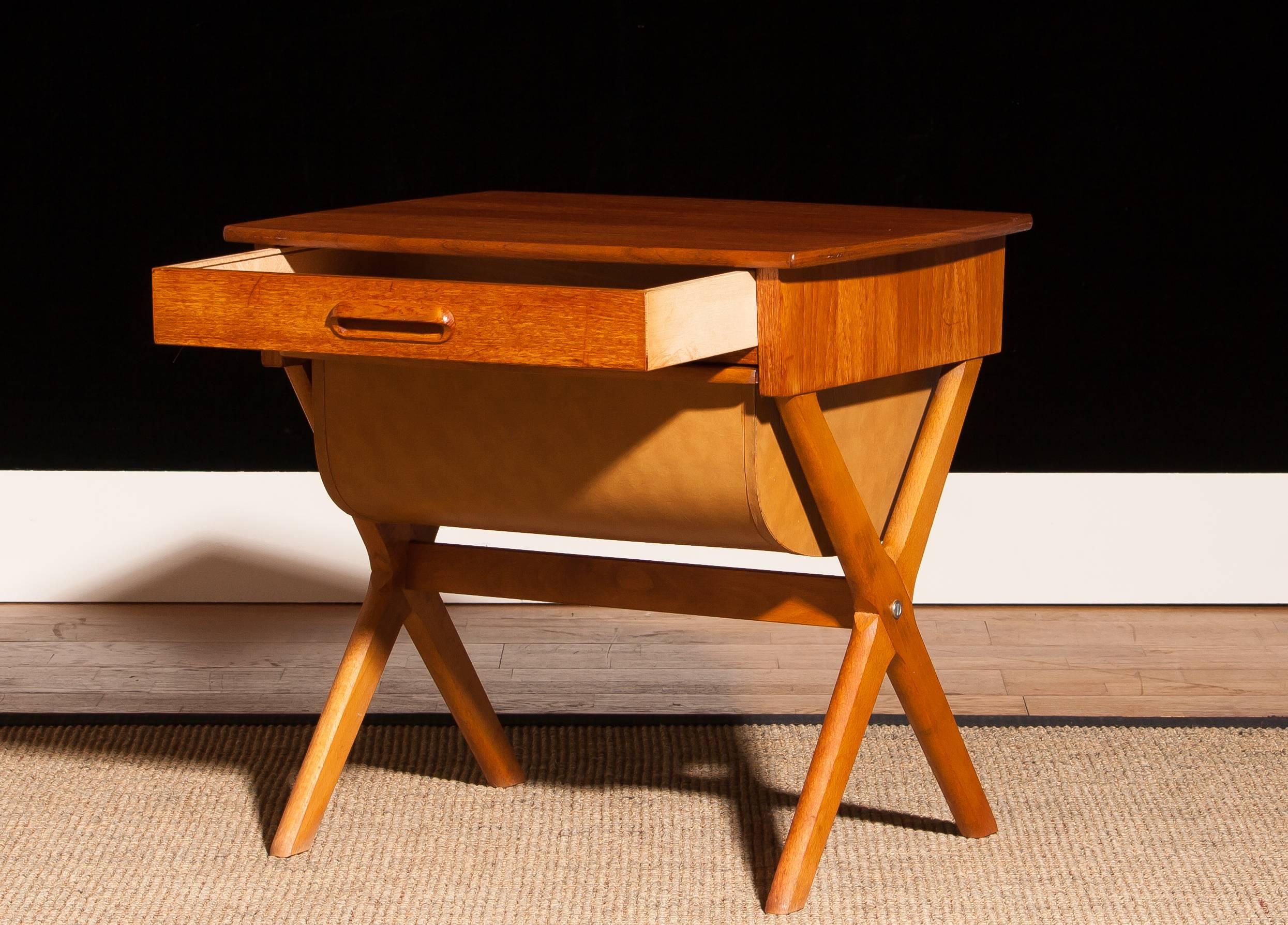 Very nice sewing table made in Sweden.
This table is made of teak and has one normal drawer and one deep drawer.
It is in a beautiful condition.
Period 1960s
Dimensions H 52 cm, W 52 cm , D 45 cm.