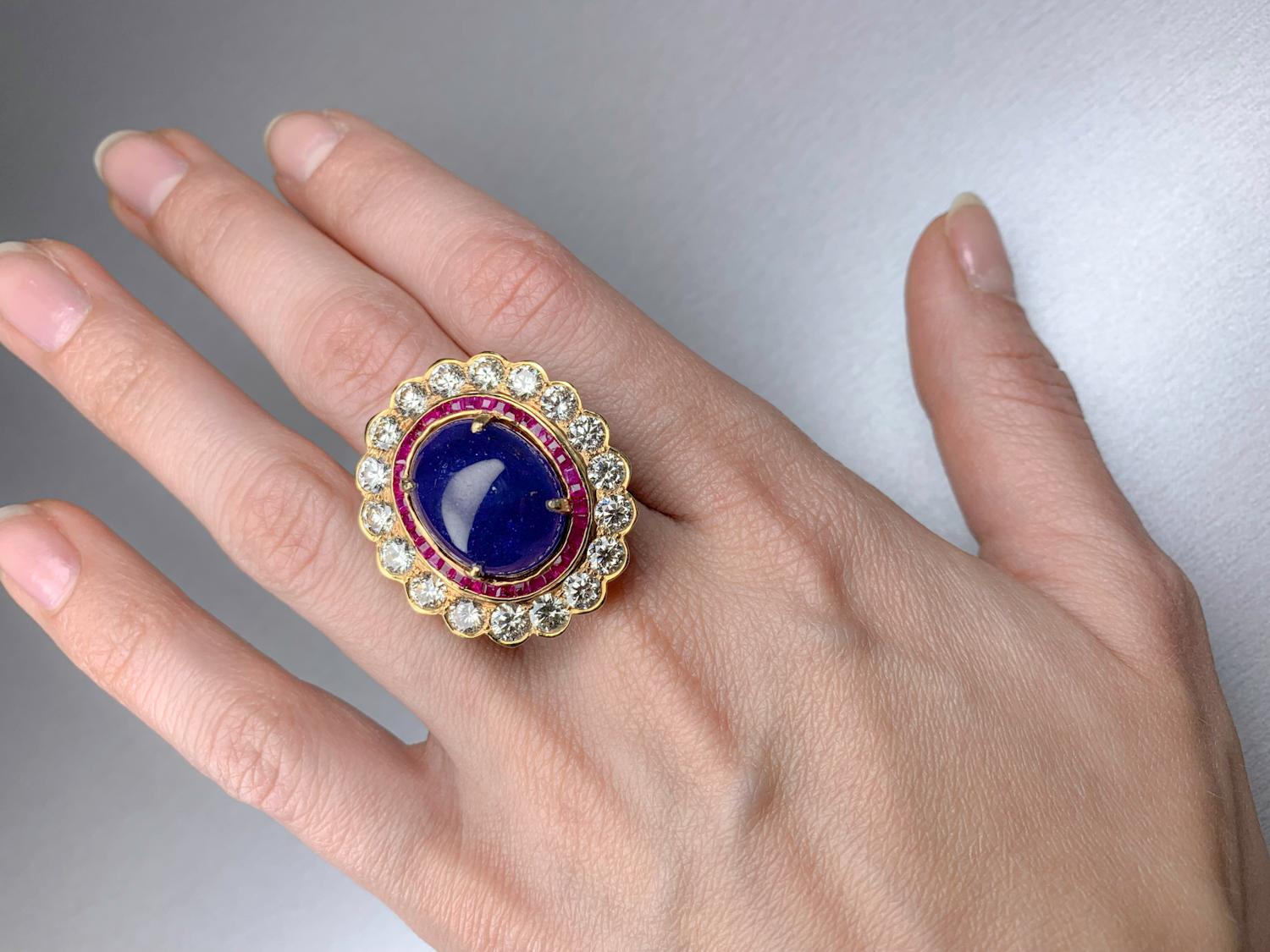 Women's 19.61 Carat Tanzanite with 1.41 Carat Ruby and 4.89 Carat Diamond 18K Gold Ring For Sale