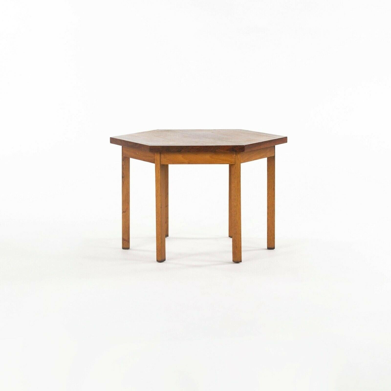 Listed for sale is a gorgeous pair of Delineator Group occasional tables (side tables), model 995-86, designed by Paul Mccobb and produced by Lane. These are rare examples from circa 1961. The pair was specified in rosewood, accompanied by walnut