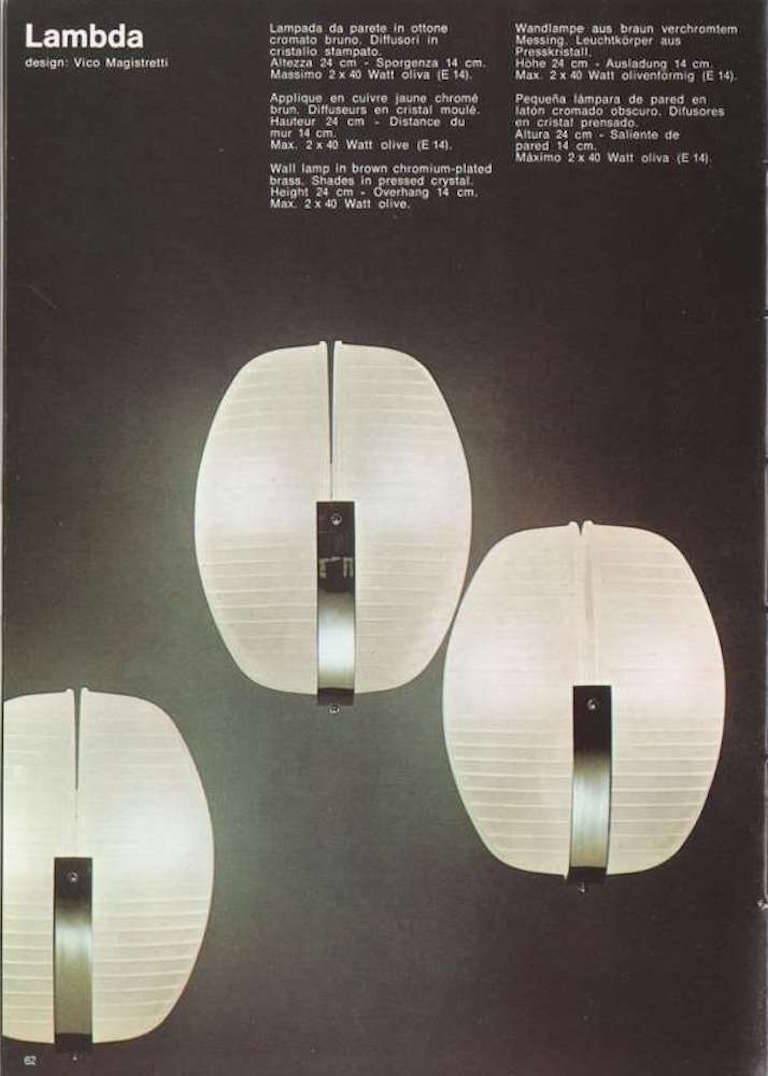 1961 Vico Magistretti 'Lambda' wall light for Artemide. Executed in chromium plated brass and pressed holophane glass. This incomparably architectural and refined Italian wall lamp emits a warmly filtered light through its glass shade. Vico