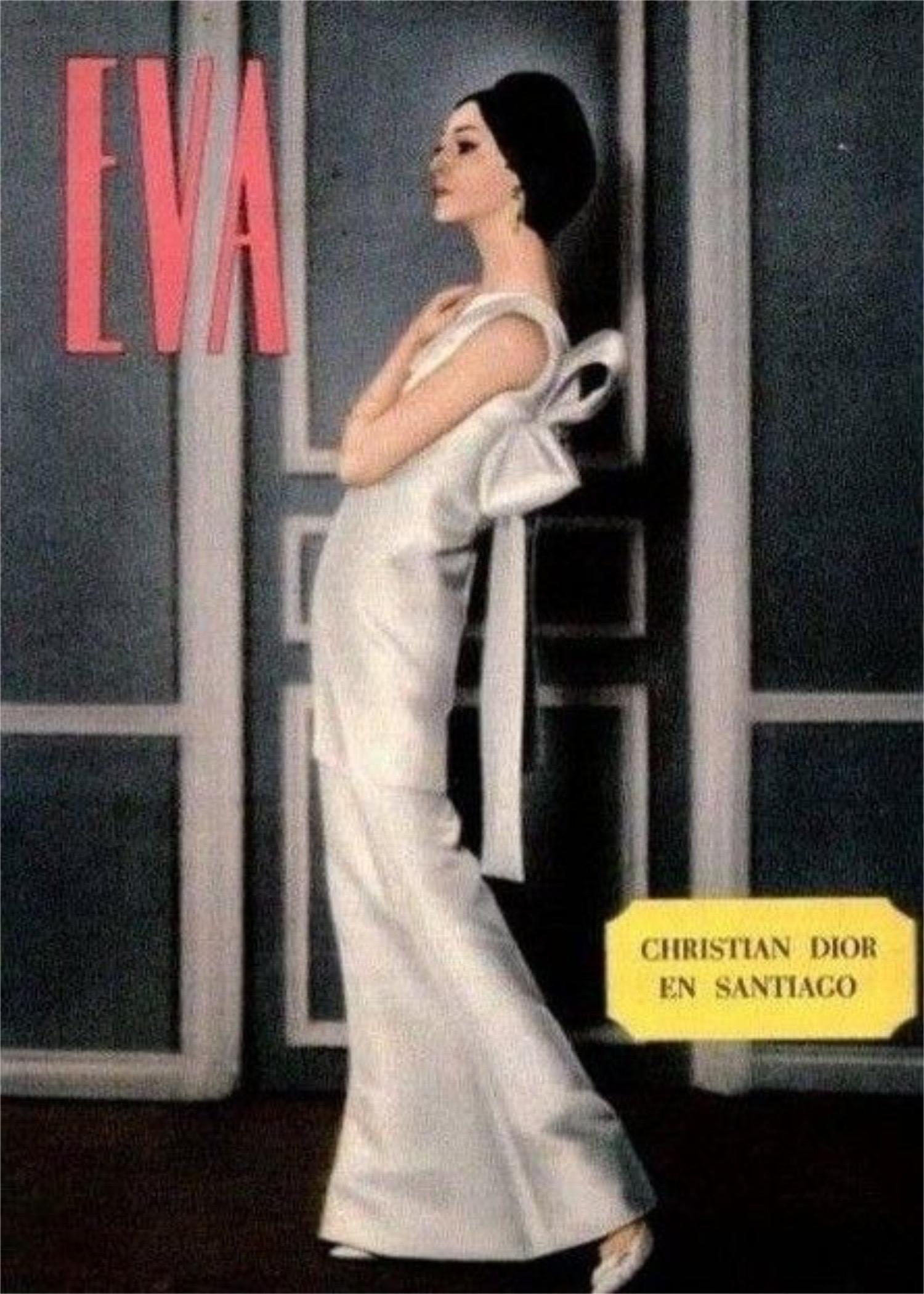 An ultra chic and highly coveted Christian Dior custom demi couture museum-quality ivory and metallic silver floral motif silk brocade gown dating back to fall/winter 1962. This incredible work of wearable art was a custom made commission while Marc