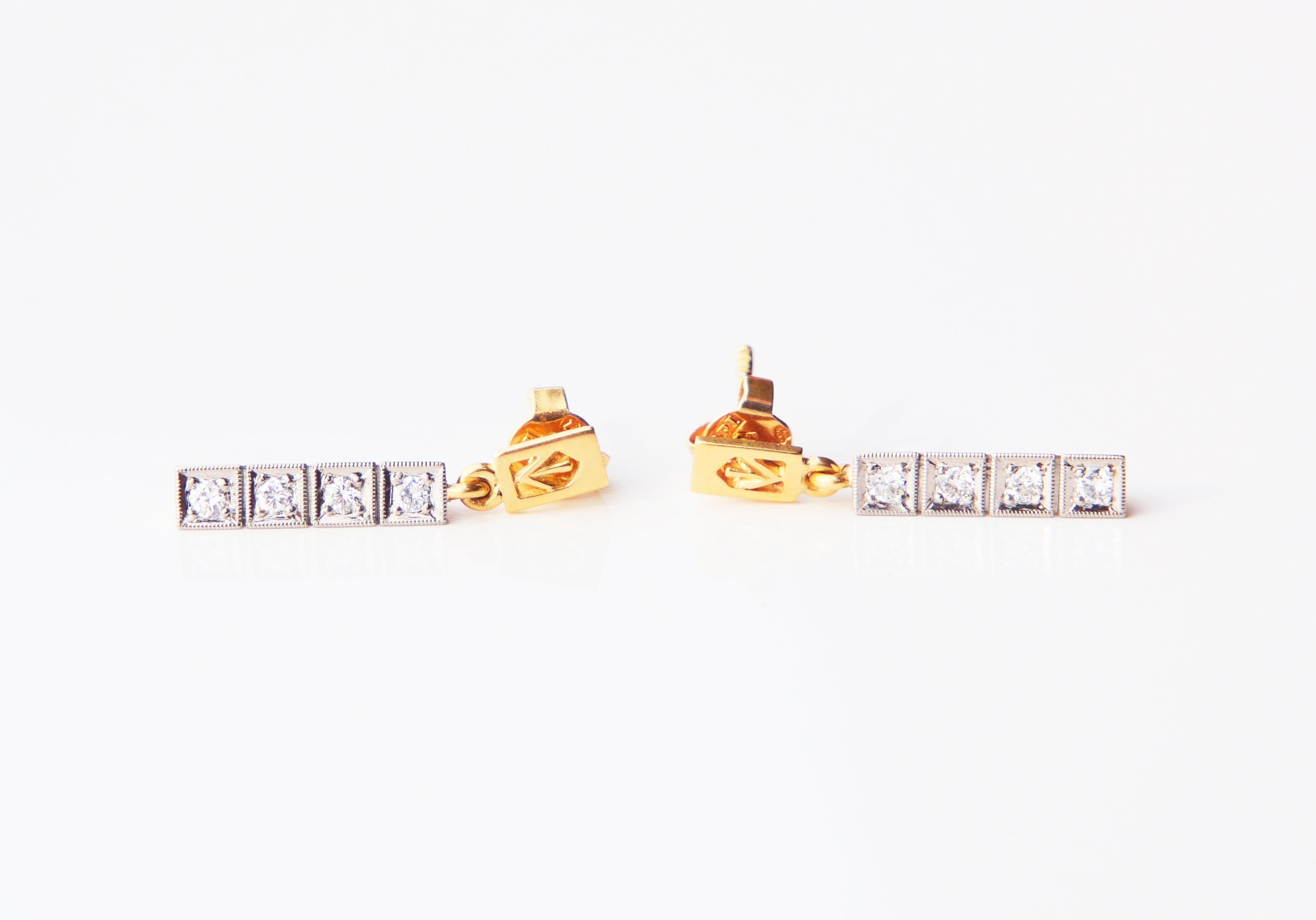 A pair of Swedish hand-made Earrings with parts in solid Yellow 18K Gold and Platinum. Each bar with platinum face that holds four prong set diamond cut natural Diamonds Ø 2.2 mm / 0.05ct each. All diamonds with their backs closed. Color ca. F-H,
