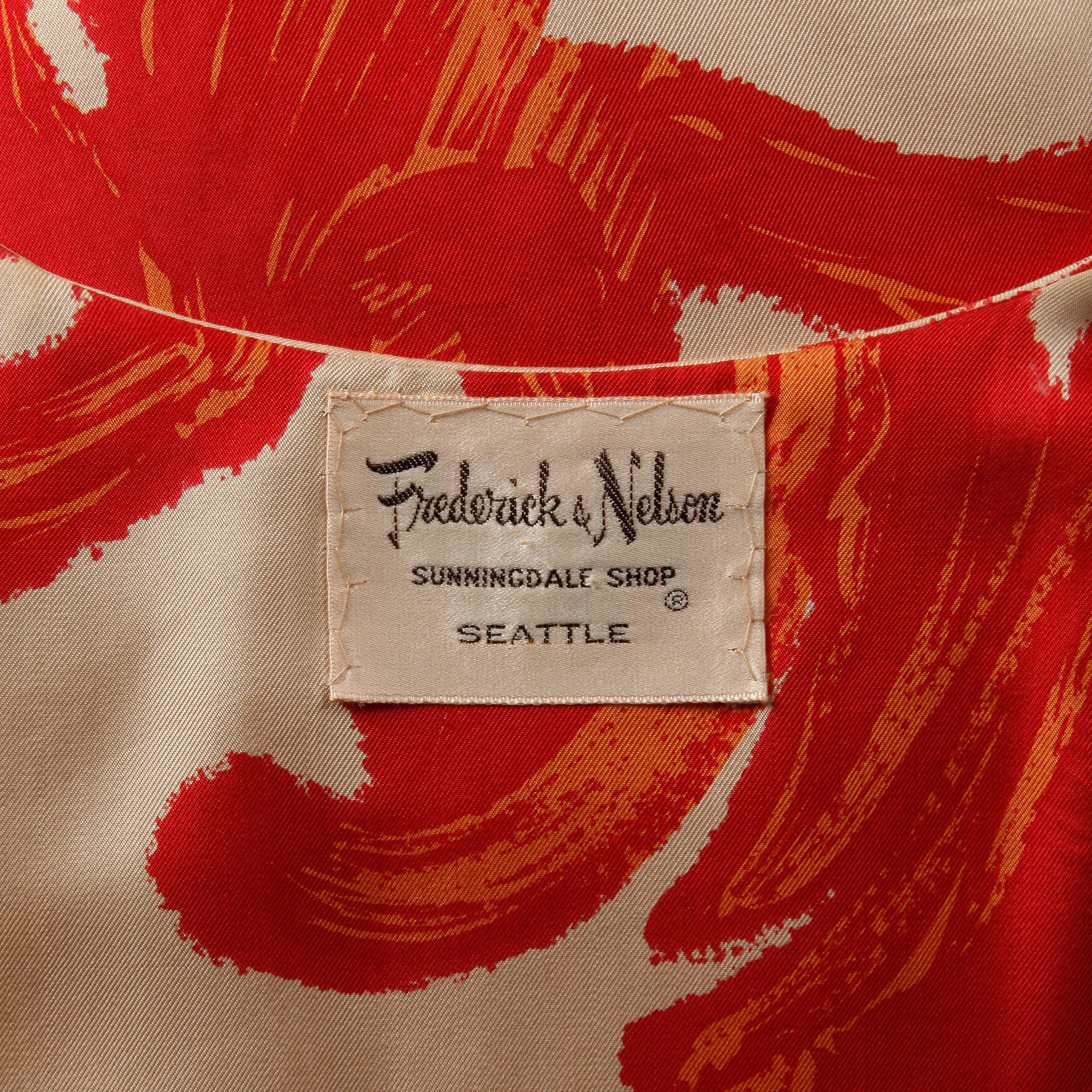 Stunning vintage silk short sleeve coat or jacket by B.H. Wragge with a red-orange mid century print. *Please note the B.H. Wragge label is missing. We know the year because we own the matching dress (also listed on 1st Dibs). Fully lined with front
