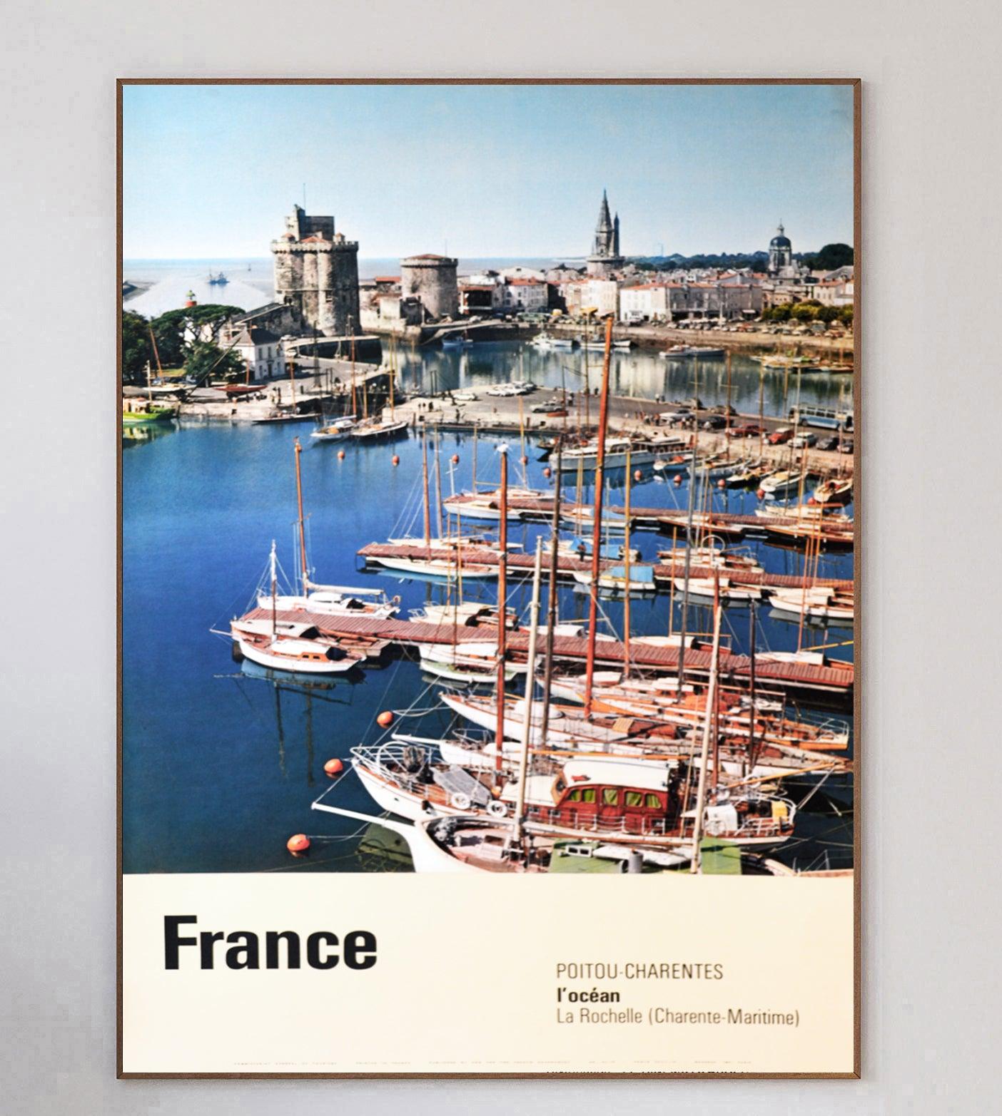 Wonderful poster promoting the region of Poitou Carantes on the South-Western coast of France. Printed in 1963 by Draeger, this original travel poster was created for the Tourism Office of France.

Depicting a sunny day on the La Rochelle port, this
