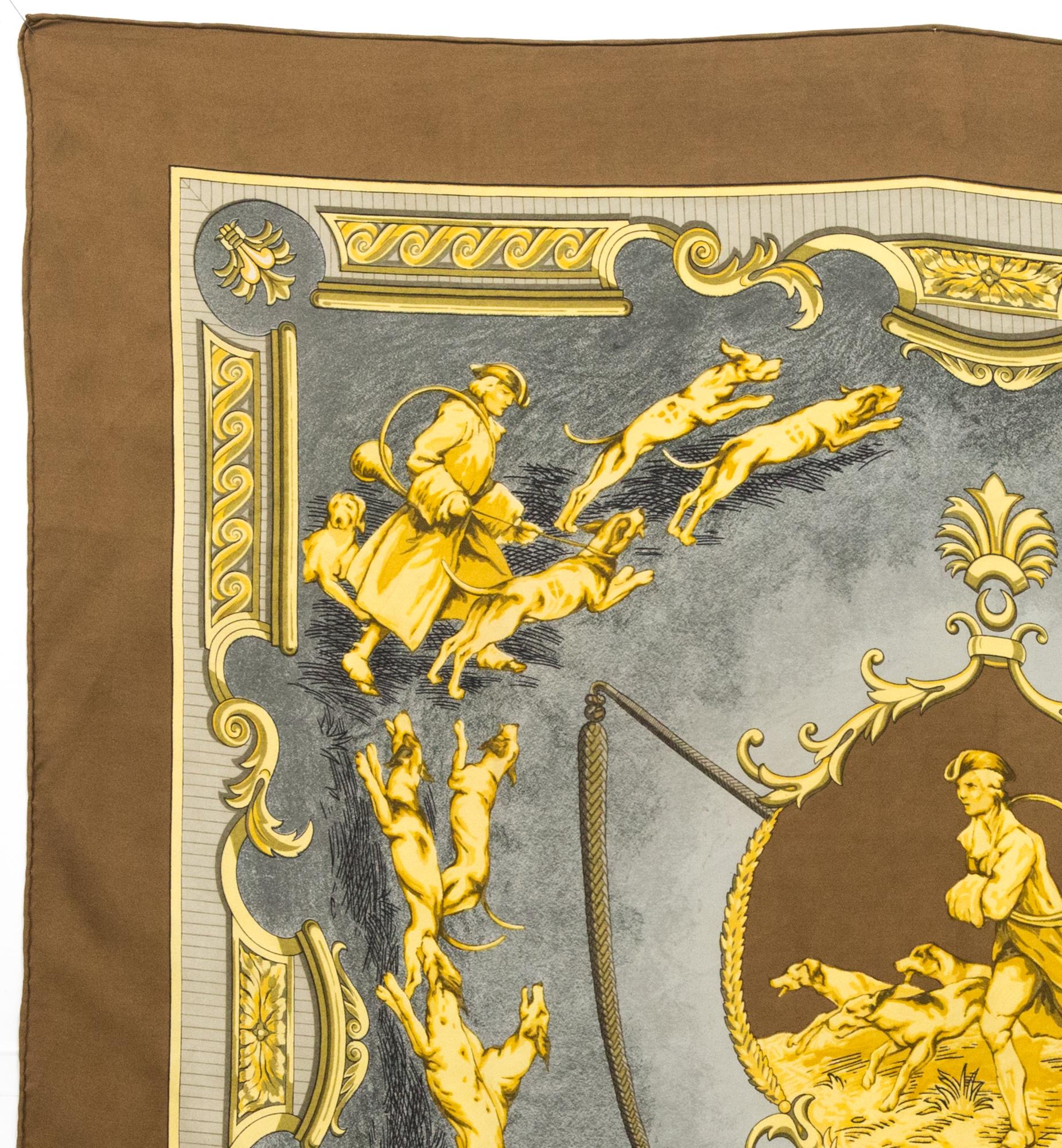 Very rare, Hermes silk scarf Chiens et Valets by Charles J. Hallo featuring a nut border and a Hermès signature.  
Circa 1963 No other edition
In good vintage condition. Made in France.
35,4in. (90cm)  X 35,4in. (90cm)
We guarantee you will receive