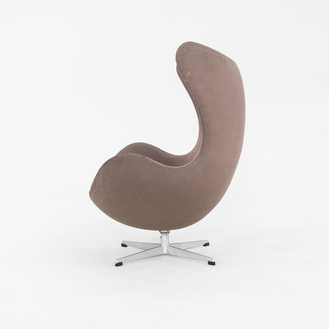 Steel 1964 Arne Jacobsen Egg Lounge Chair and Ottoman with Brown Fabric Upholstery For Sale