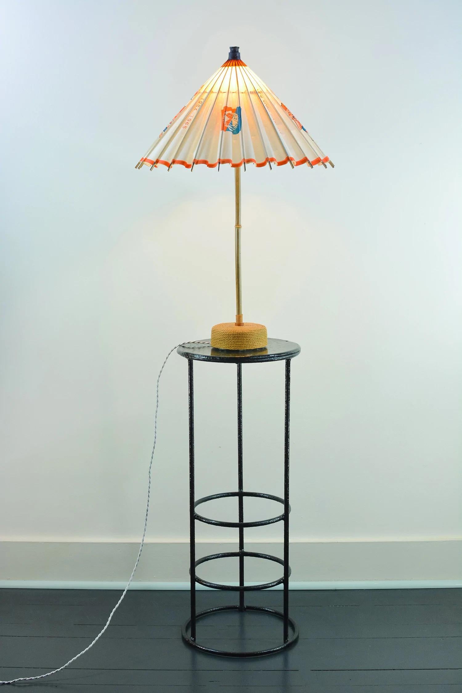 The World’s Fair Collection is a family of fixtures handmade from sustainably sourced materials and upcycled antique paper parasols given to visitors at the 20th century’s most illustrious cultural expo.

Model No. 005 features a rice-paper shade