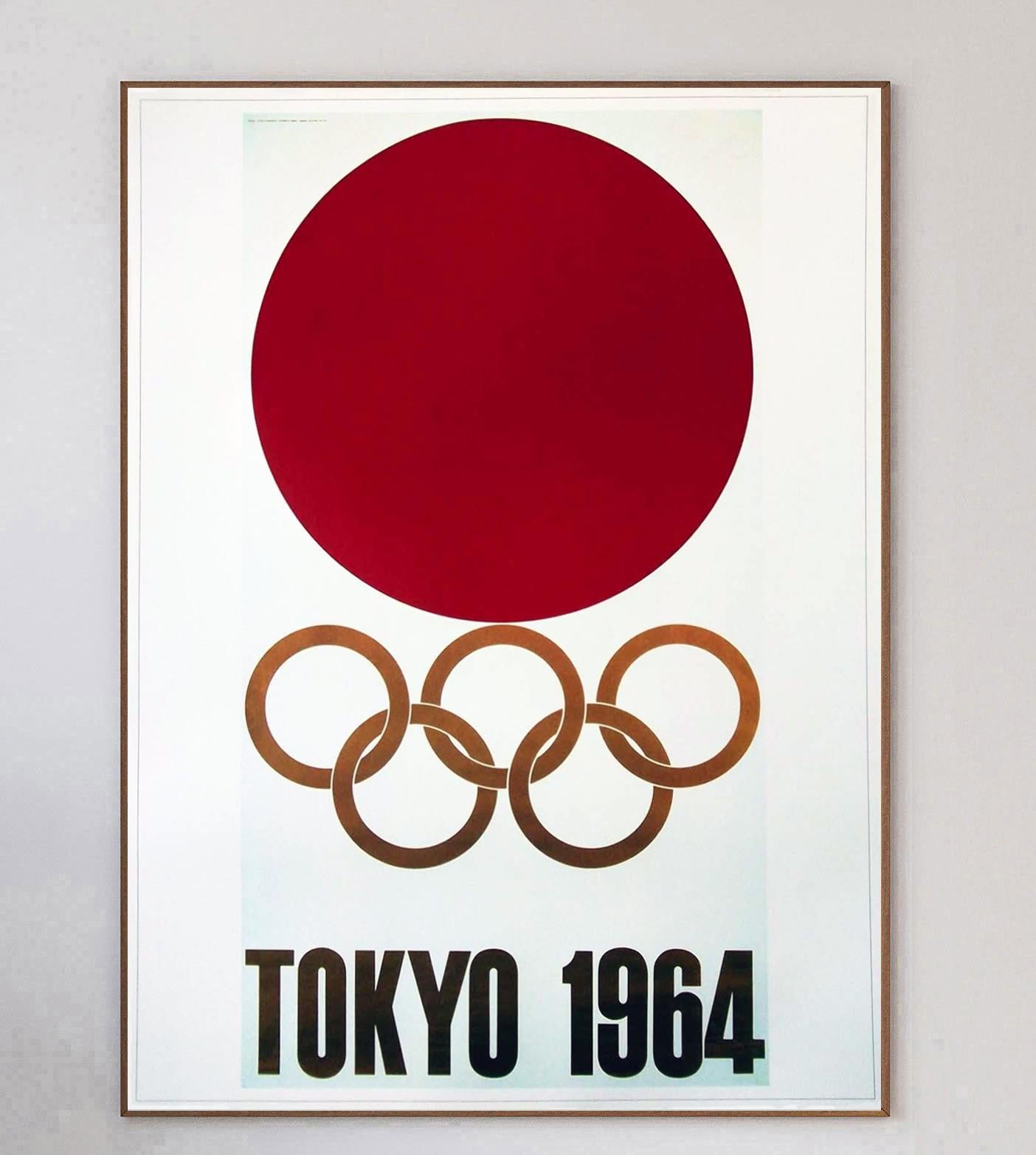Beautiful poster featuring the logo for the 1964 Tokyo Olympic Games. The first games to be held in Asia, and also the first to be televised internationally without needing to fly tapes overseas, the United States were the winners of the events with