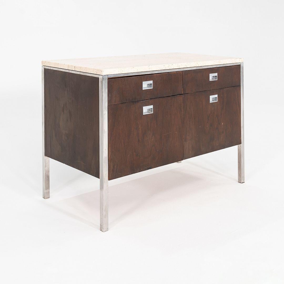 This is a Custom 2-position credenza, produced in 1965 and designed by Davis Allen and Gordon Bunshaft for the interior of the Chase Manhattan Bank headquarters, one of Bunshaft and SOM's most notable projects. It features walnut veneer throughout