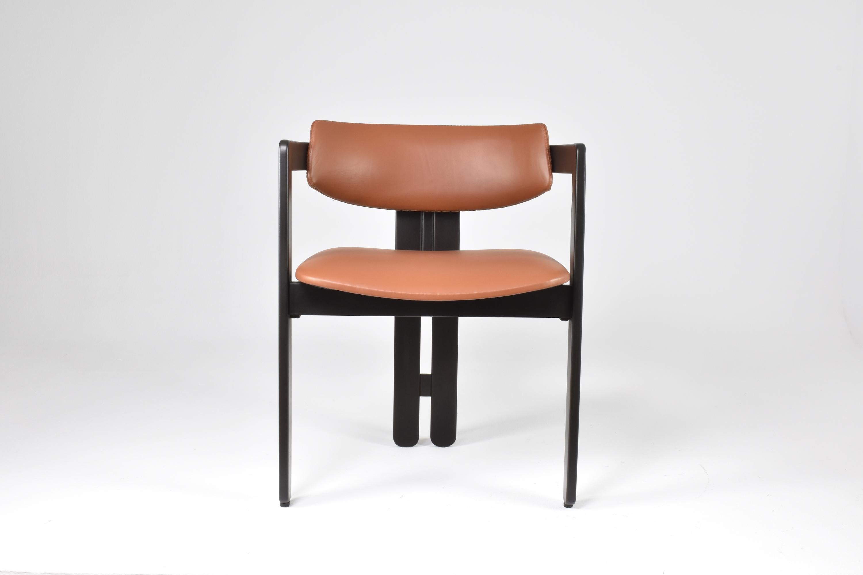 The Augusto Savini 'Pamplona' Chair is an iconic furniture piece designed in Italy and made in 1965. Augusto Savini was an esteemed Italian designer known for his innovative and modern furniture designs during the mid-20th century. 

It features a