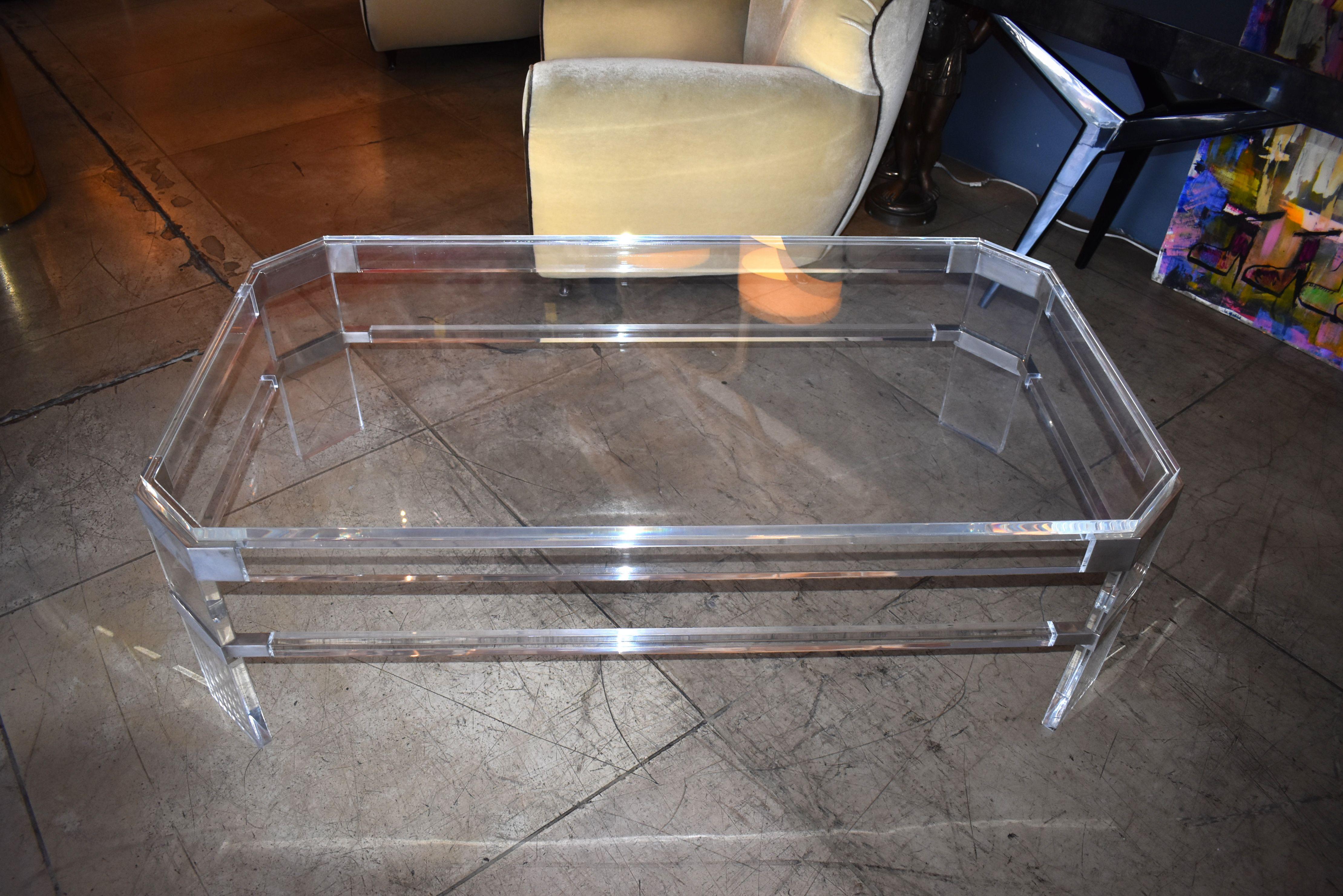 Metric design Lucite coffee table with chrome finish details signed and dated by Charles Hollis Jones.