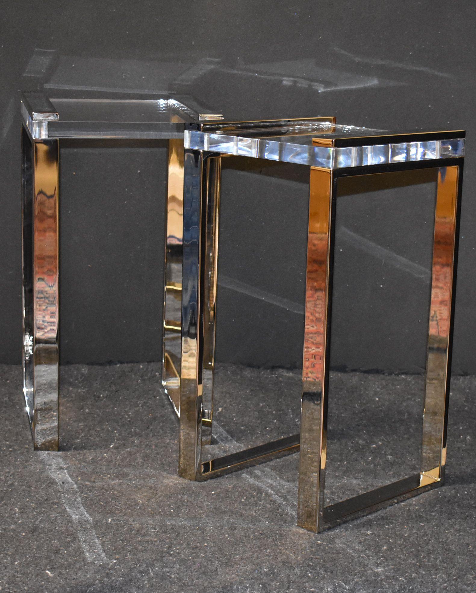 Pair of polished nickel-plated and Lucite side or drink tables designed and manufactured by Charles Hollis Jones 