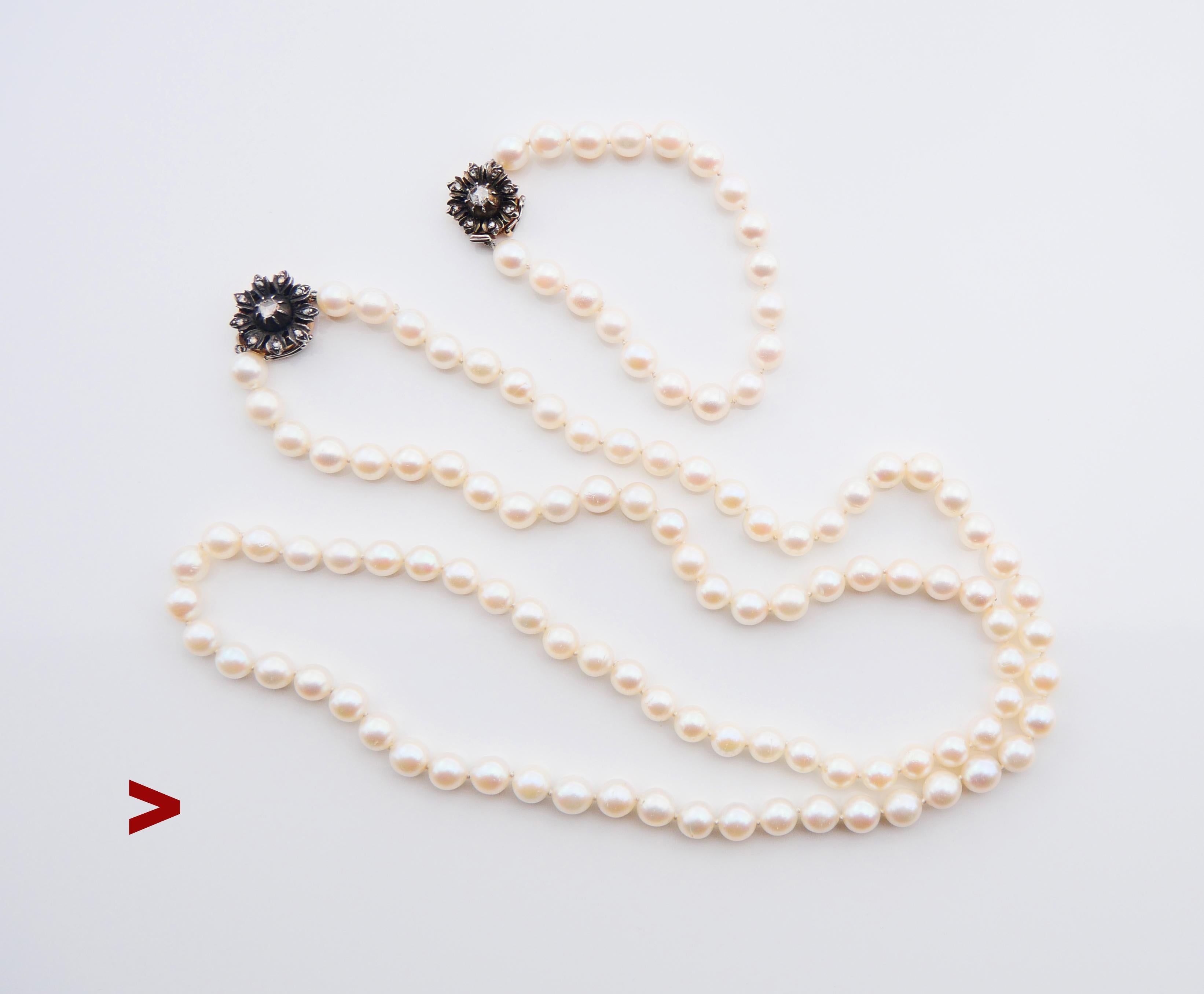 Fine Vintage matching Set Necklace and Bracelet featuring a beautiful set of equally sized cultured Sea Pearls complemented with original V-locks with safety clutch in solid 18K Yellow Gold decorated with natural rose cut Diamonds .

Both locks have