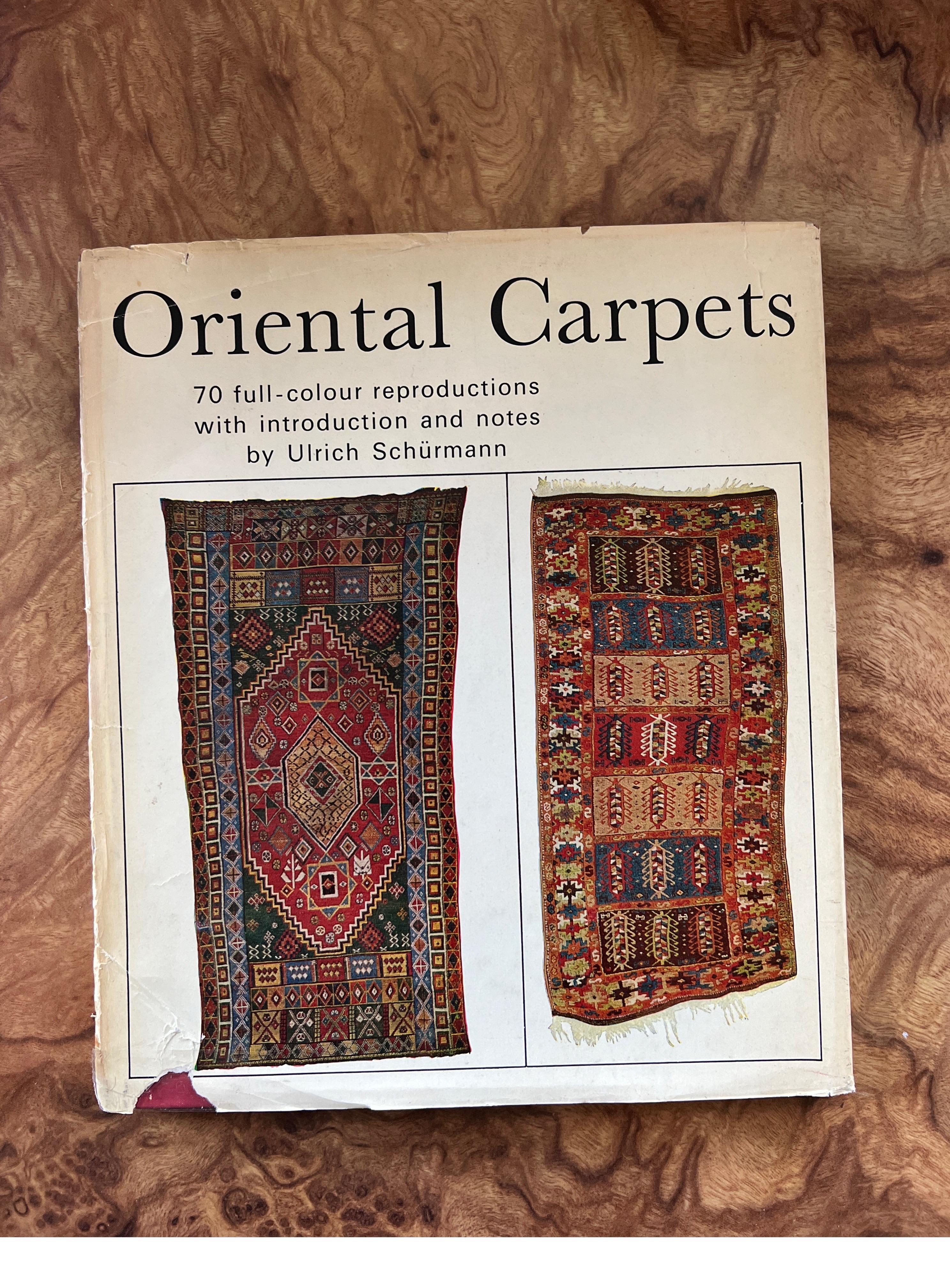 An exquisite vintage look at the different types of handwoven carpets and rugs that have captured interior design through the ages. Book jacket has some wear, book and pages still in tact and good condition. 

9.5” x 11”