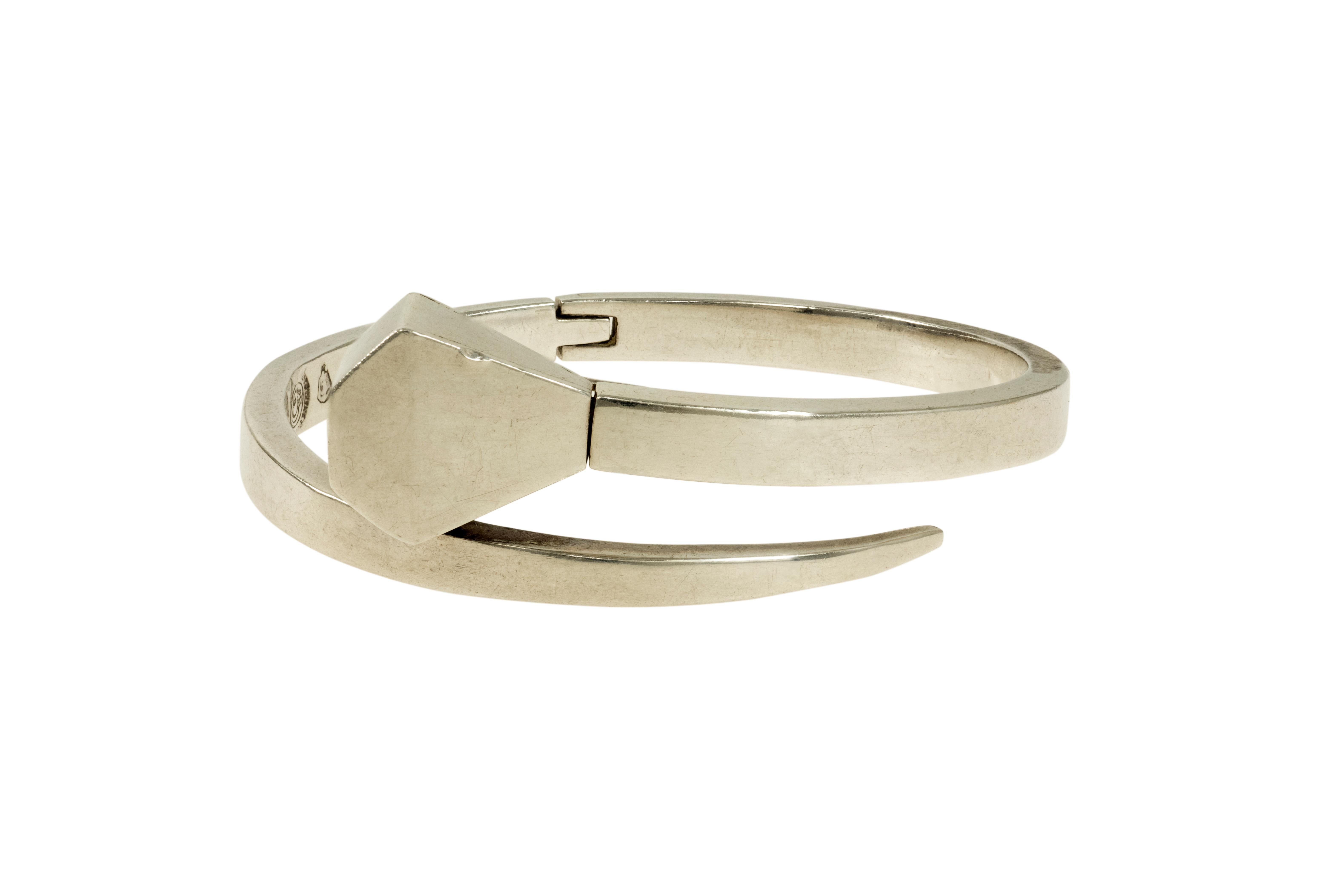 A sterling silver nail design collar and bracelet, by William Spratling, c. 1965.

The pieces are stamped for William Spratling; Eagle 30. 

The collar is 15