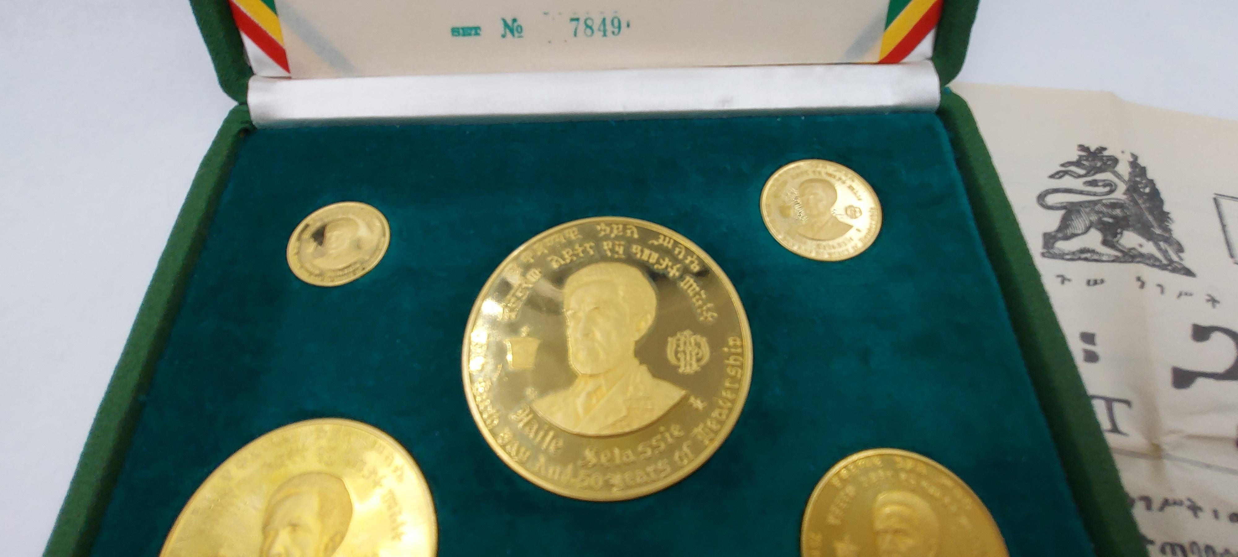 Magnificent 1966 Ethiopian Proof 22 carats yellow gold (152.80 grams) coin set. The biggest coin’s diameter is 
55 millimeters, the smallest coin’s diameter is 20 millimeters. Hallmarks. The gold coin set celebrates 
the 75th birthday and 50 years
