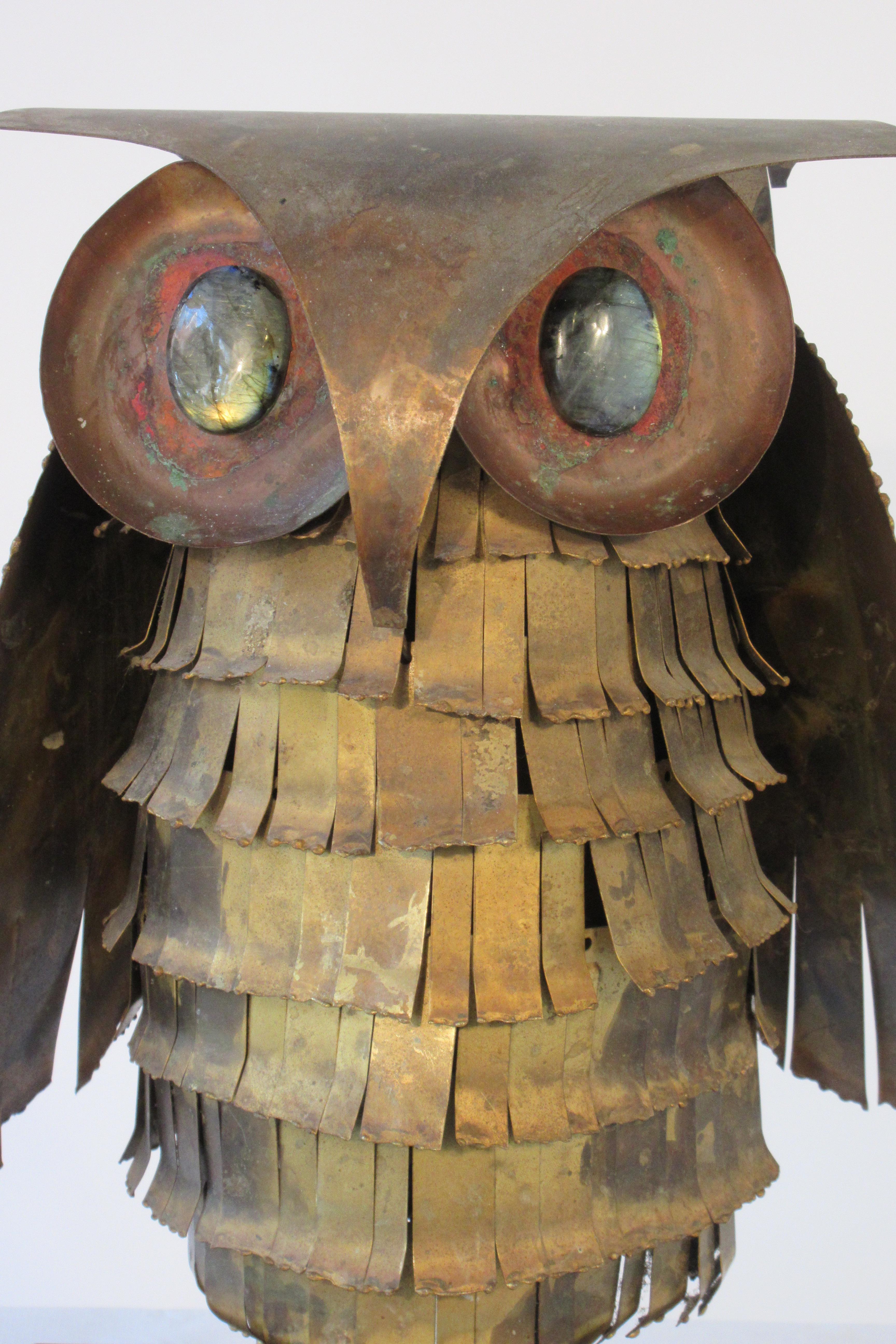 Signed Jere brass owl with stone eyes on wood base. Gallery label on wing. Dated 1966.