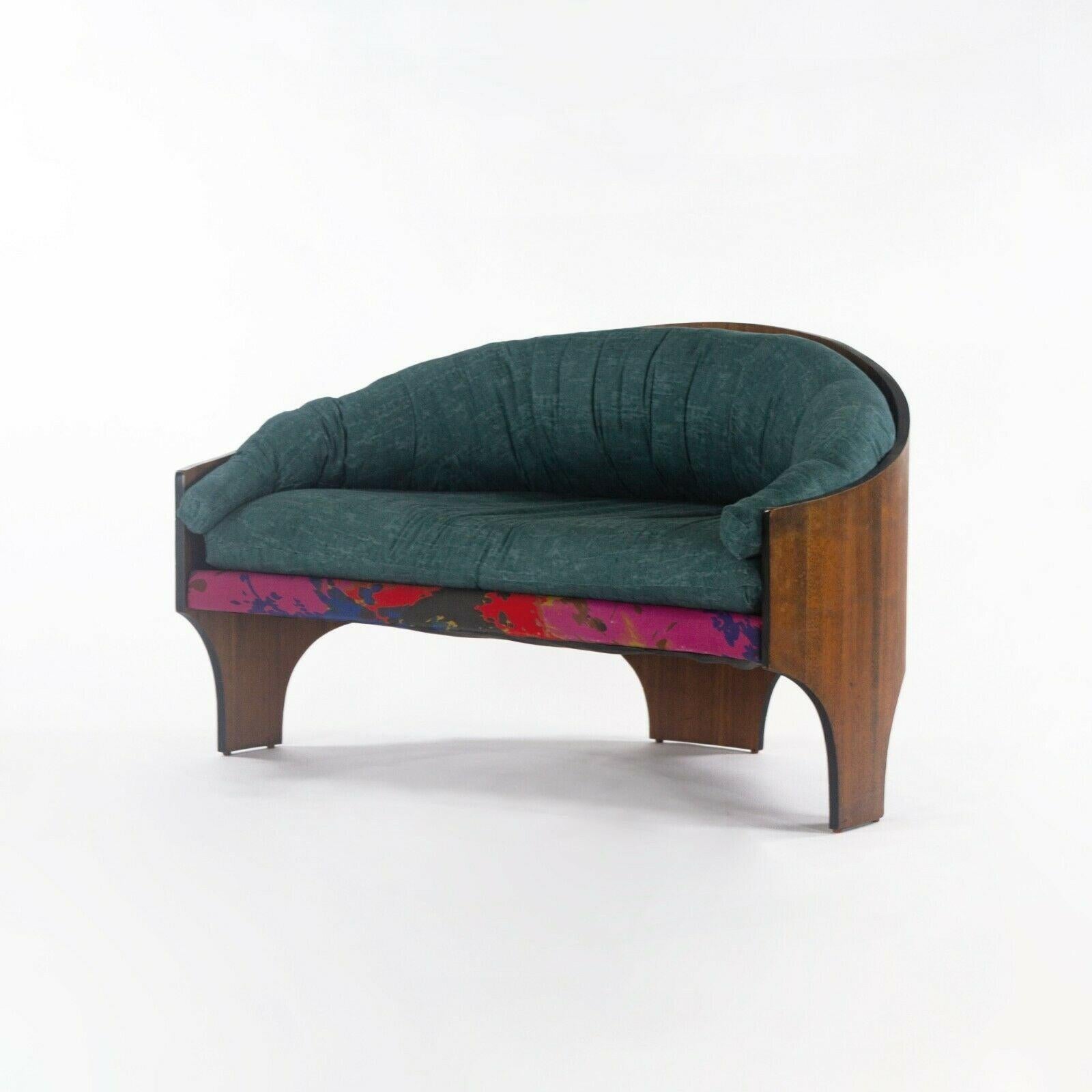 Listed for sale is a very rare Henry P. Glass for Deco House Inc. intimate island settee. Henry P. Glass was an influential designer, educator, and architect, who produced unique works of furniture that are quite difficult to find. This example came