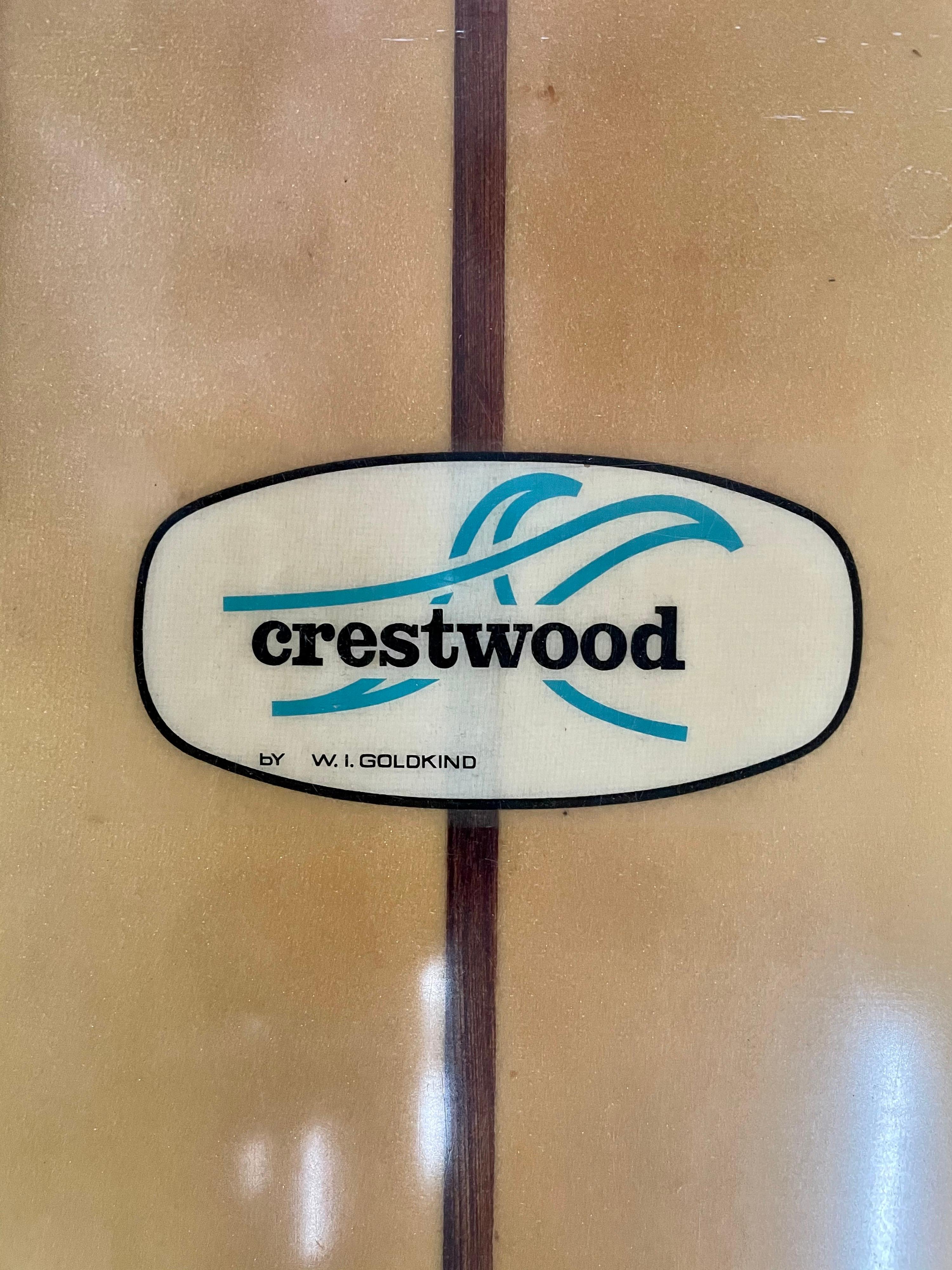 This is an all vintage, fully restored 1960s surfboard (longboard) by Crestwood. It is roughly over 10 feet long. This lovely piece of history was lovingly restored and collected by an avid surfer before it came to Gustavo Olivieri antiques.