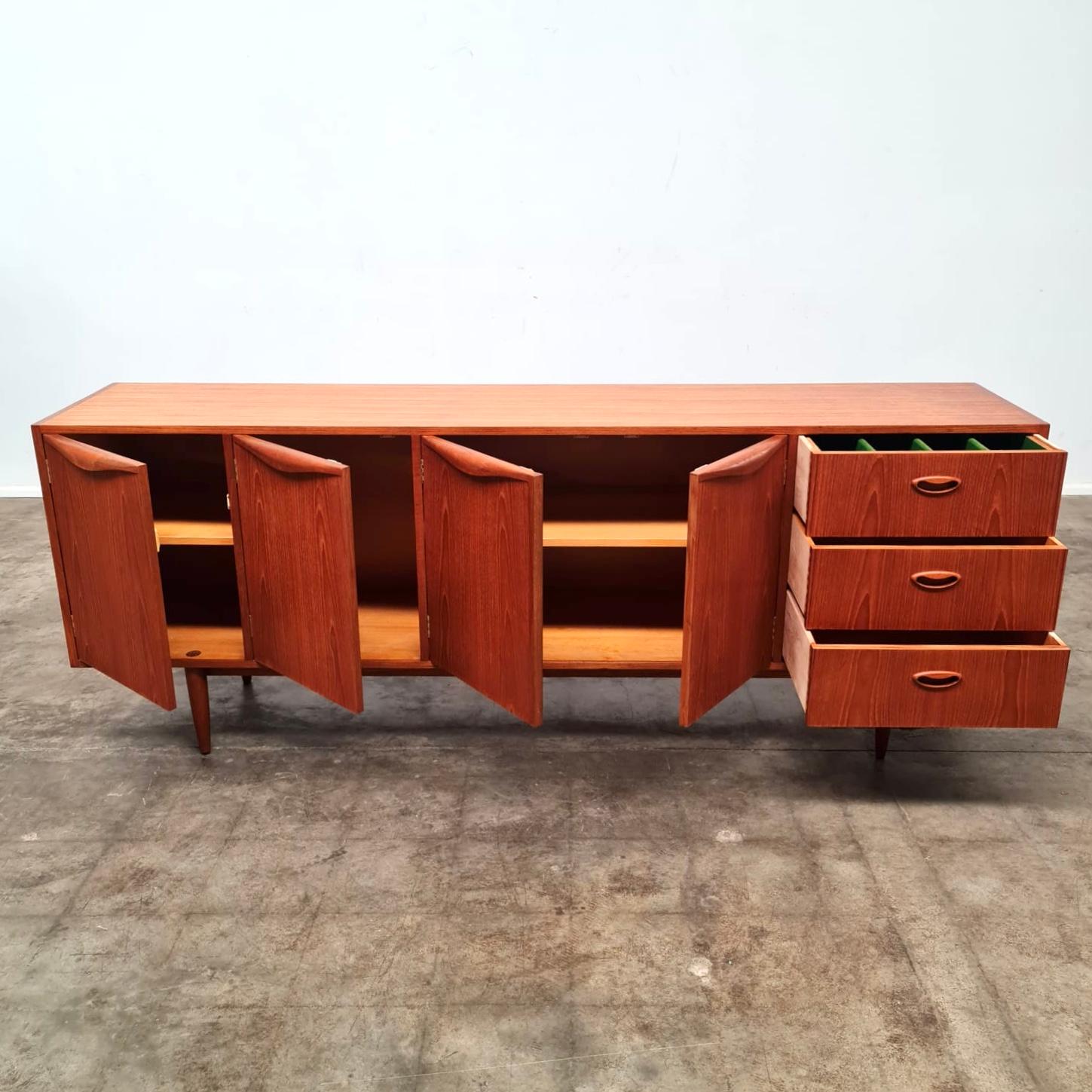 Teak 1967 Chiswell Wave Handle Sideboard For Sale