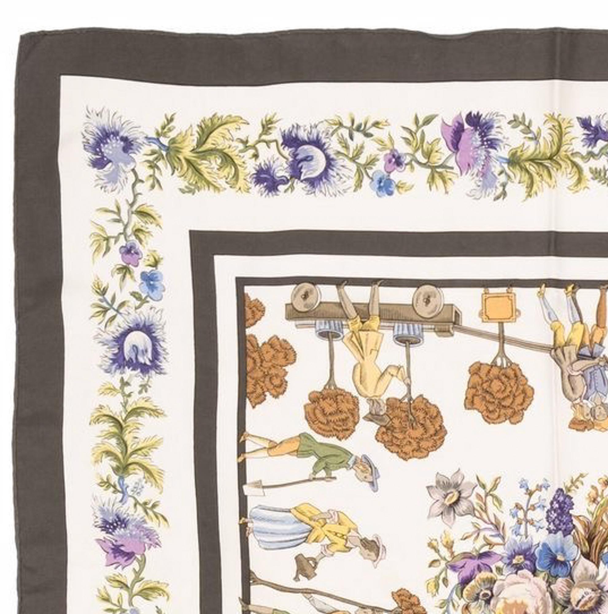 Hermes silk scarf “Les Jardiniers du Roy” by Maurice Tranchant featuring a brown border and a top logo signature. 
Circa 1967 
In good vintage condition. Made in France.
35,4in. (90cm)  X 35,4in. (90cm)
We guarantee you will receive this  iconic