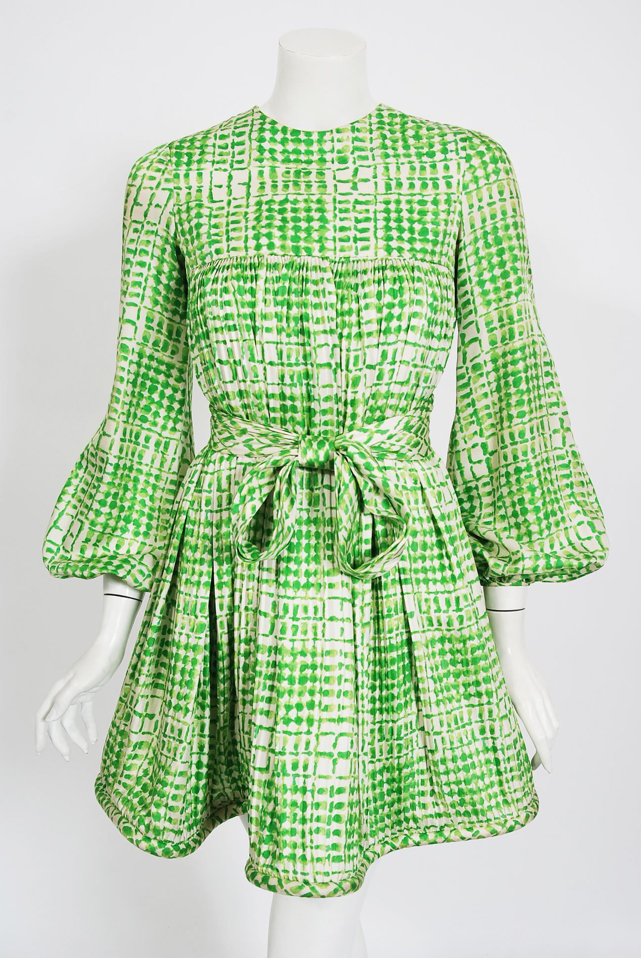 Spectacular Pierre Cardin graphic green and white print silk mod dress dating back to his 1967 collection. In 1951 Cardin opened his own couture house and by 1957, he started a ready-to-wear line; a bold move for a French couturier at the time. This
