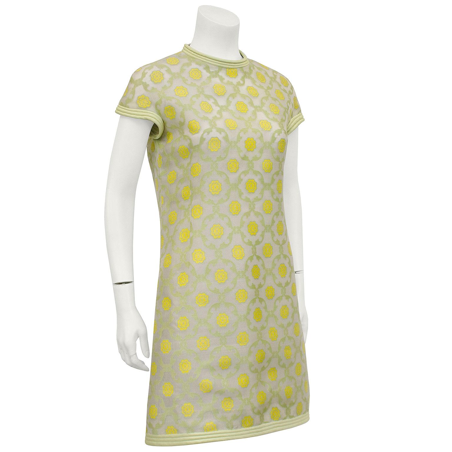 Pierre Cardin demi couture chartreuse floral silk dress from 1967. The slightly sheer silk organza, that was hand woven in India, is covered in an all over print of chartreuse diamond garlands with yellow flowers in the centers. The neckline, cuffs