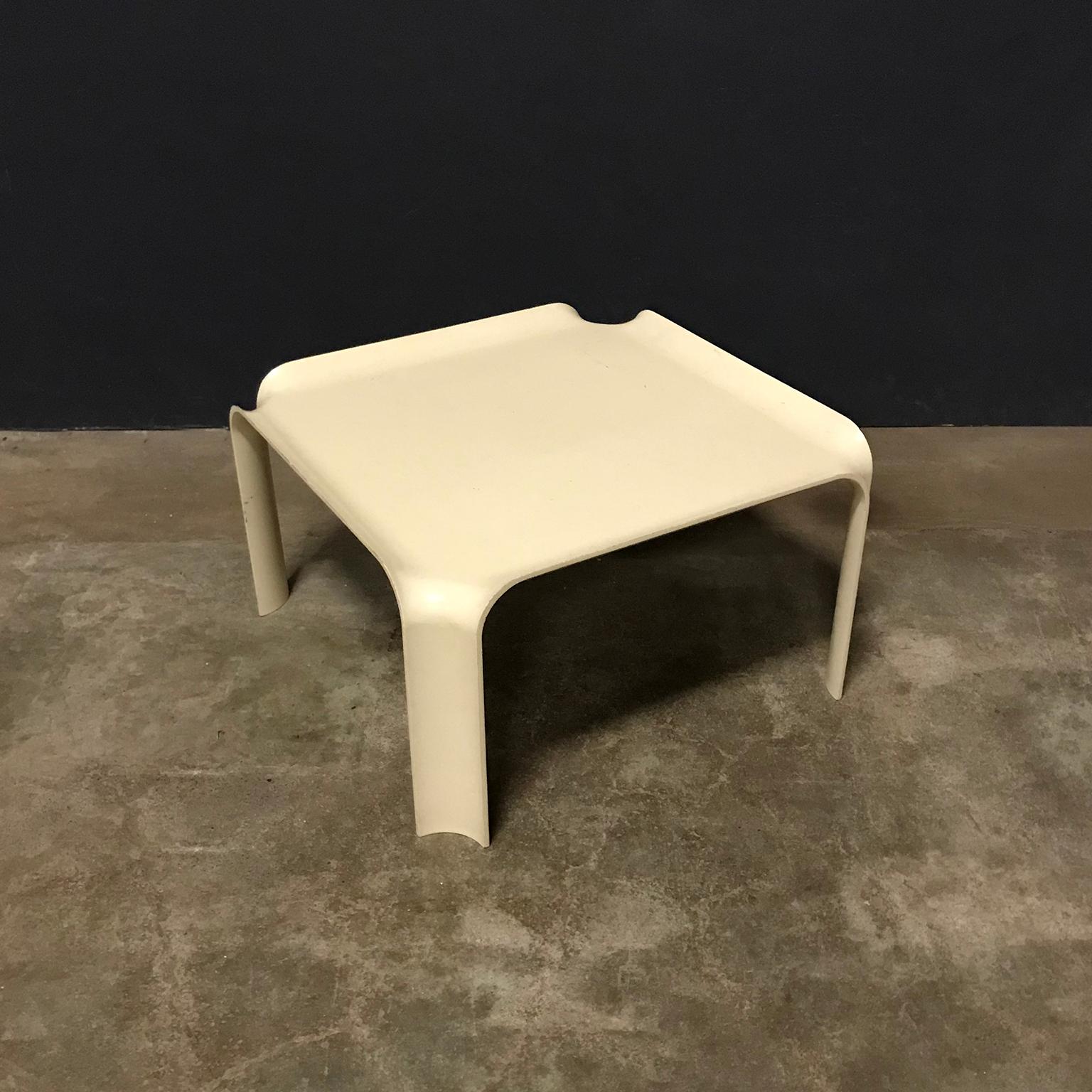 Side table in offwhite by Pierre Paulin. The table shows traces of wear like some stains, some tiny spots of paint, some minor scratches and tiny damages on the edge (see pictures).
Side table in brown is listed as well.

Weight 2 kg
The height