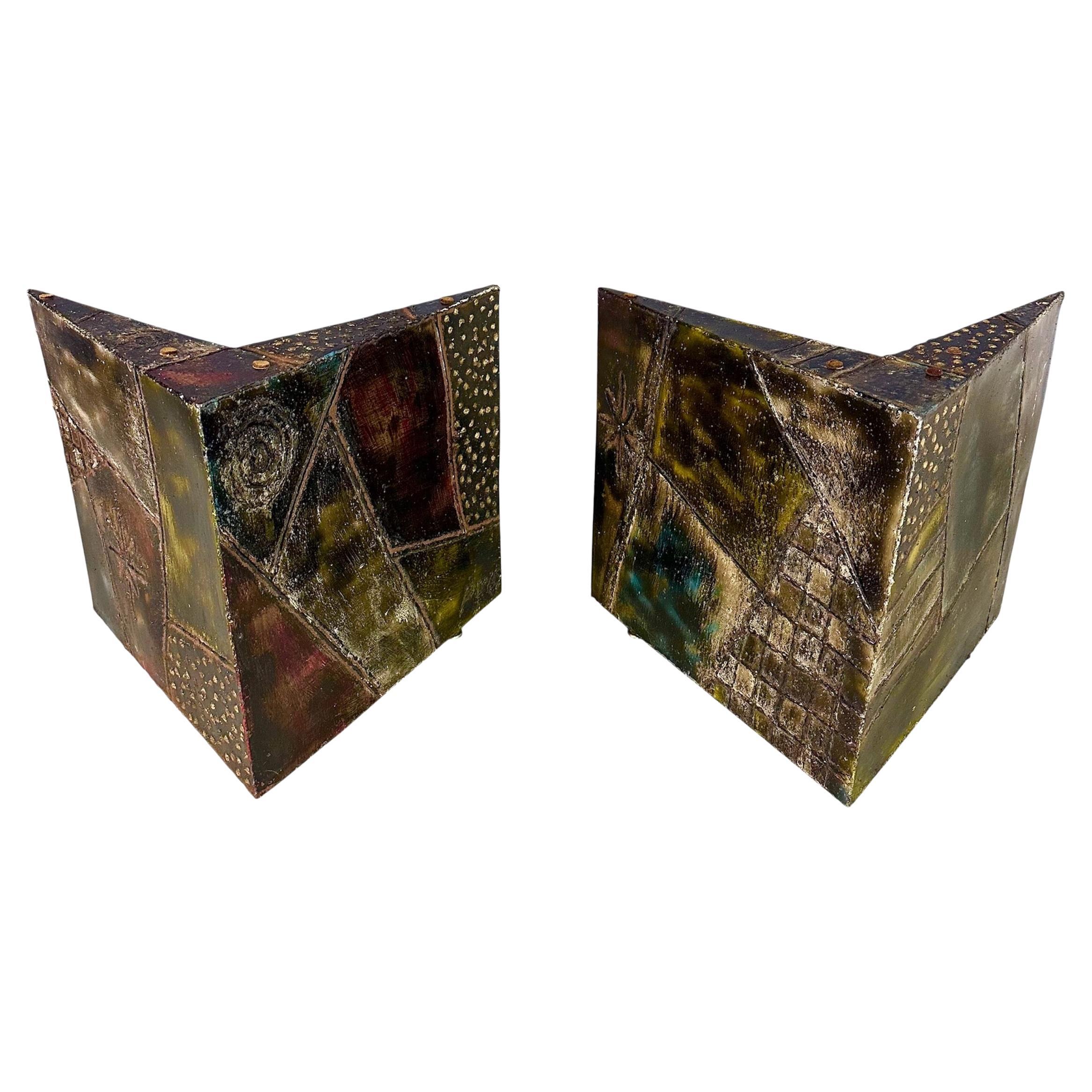 A striking pair of welded and patinated metal end tables by Paul Evans, 1967. These sculptural tables were created as separate pieces and as so are unusual, they feature Evans’ signature patchwork design with richly textured and polychrome patinated