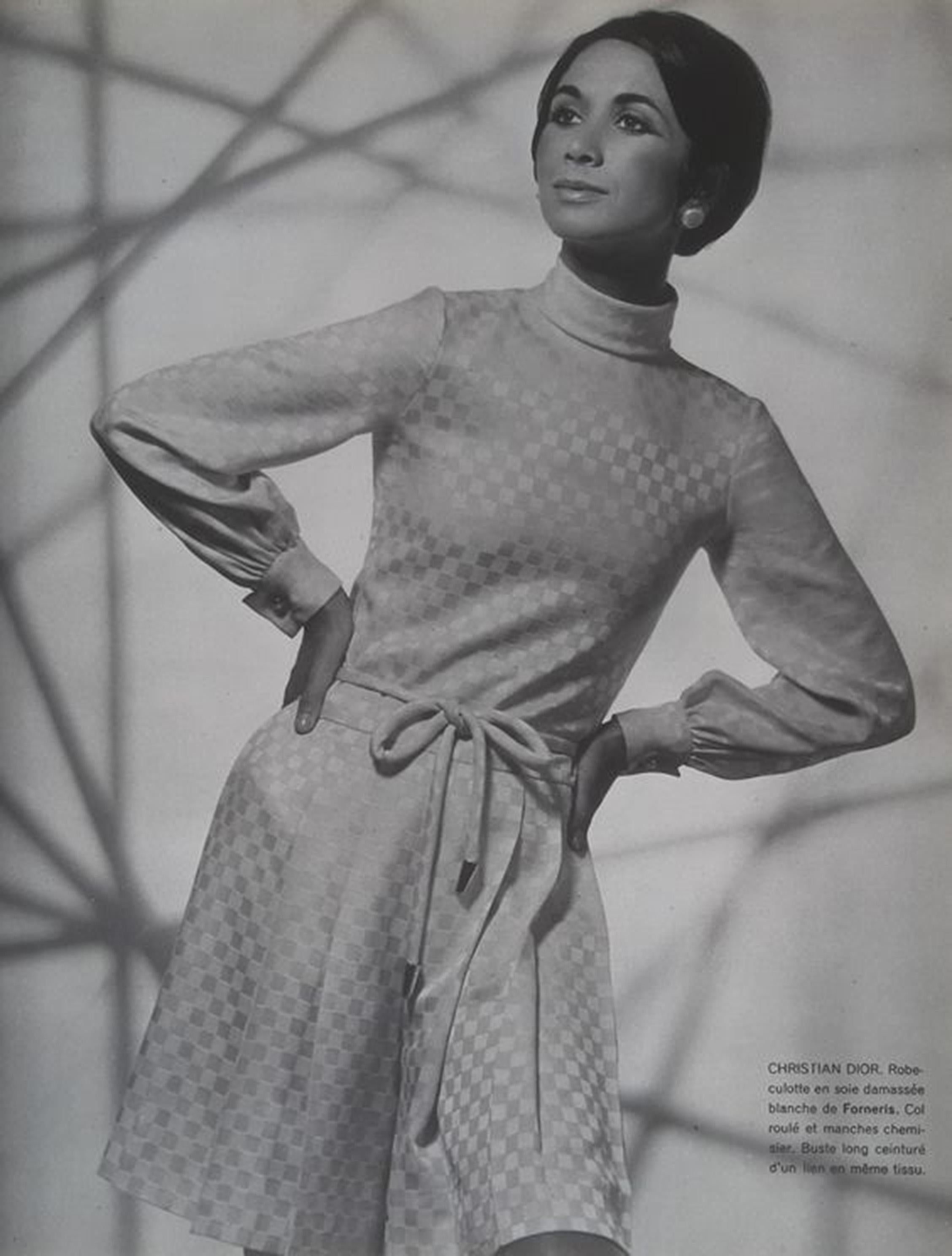 An ultra chic and highly coveted Christian Dior haute couture museum-quality ivory checkered silk pleated mini dress dating back to spring/summer 1968. This incredible work of wearable art was a custom made commission while Marc Bohan was creative