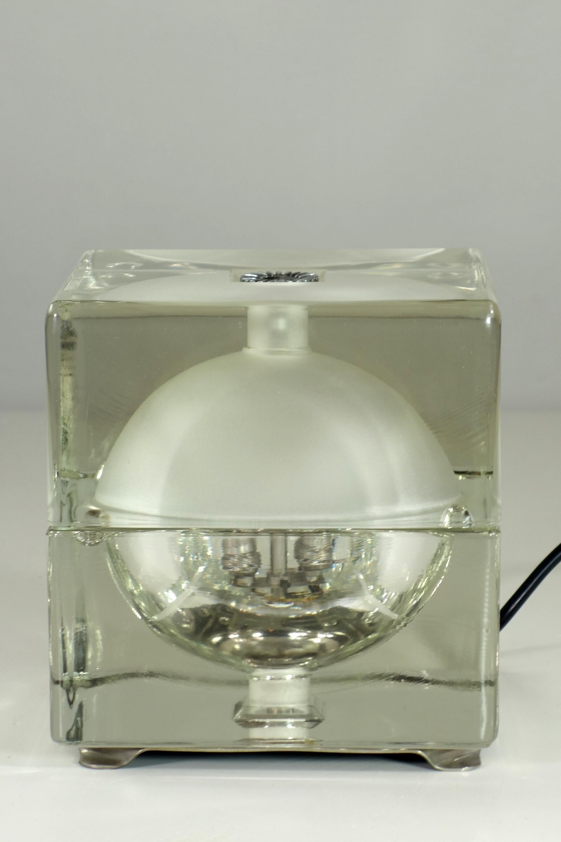 CUBOSFERA Table Lamp
Designer Alessandro Mendini
prod. Vicenza Vetraria
1968

Solid crystal glass with a hollow ball inside a cube
One glass frosted
Nickel Metal Details

Iconic Optical Italian Lamp original 1960s

Perfect working order with 2 Bulb