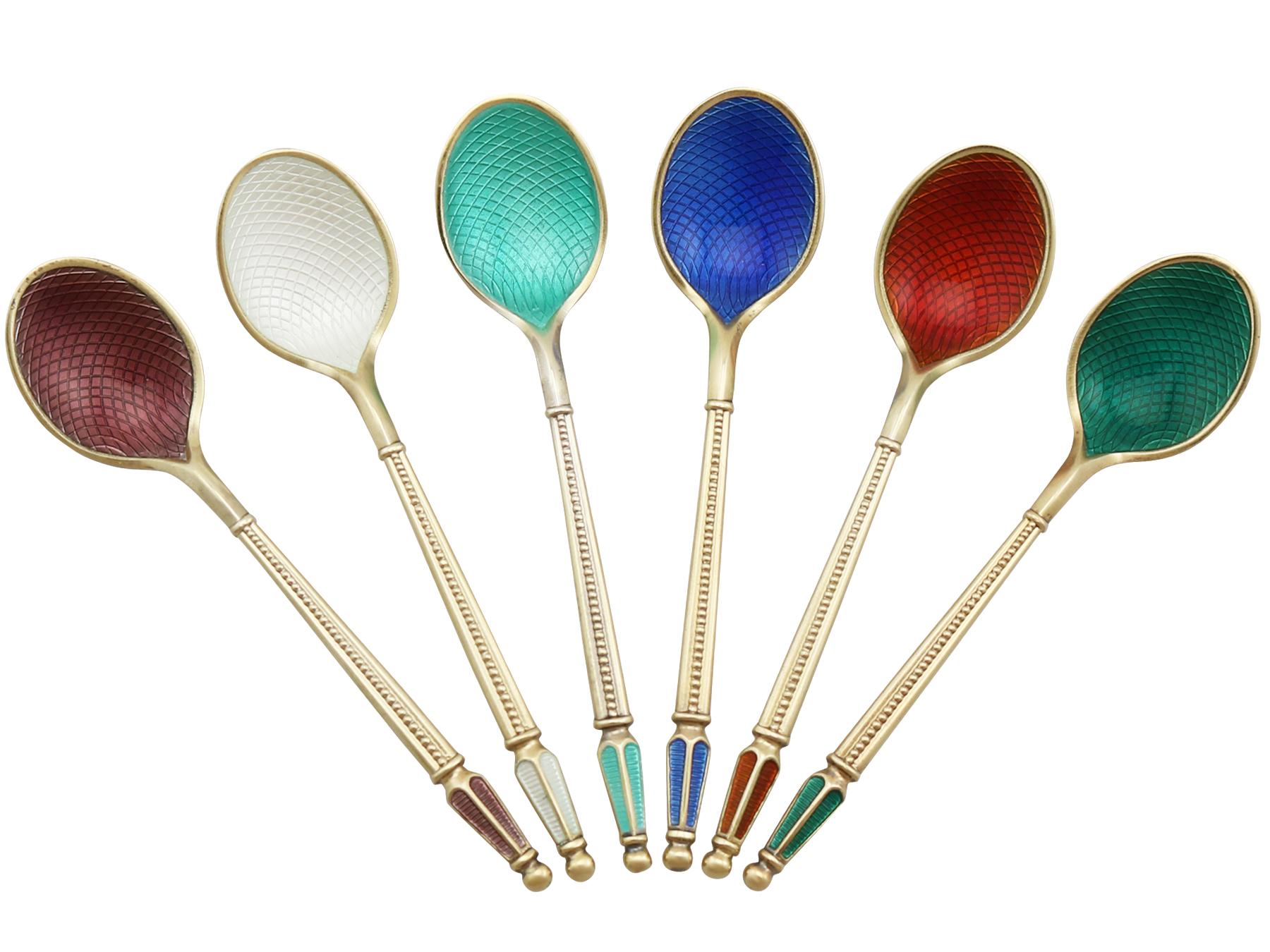 An exceptional, fine and impressive set of six antique Danish sterling silver gilt and enamel spoons - boxed; an addition to our silver teaware collection.

These exceptional vintage Danish sterling silver gilt coffee spoons have a plain rounded