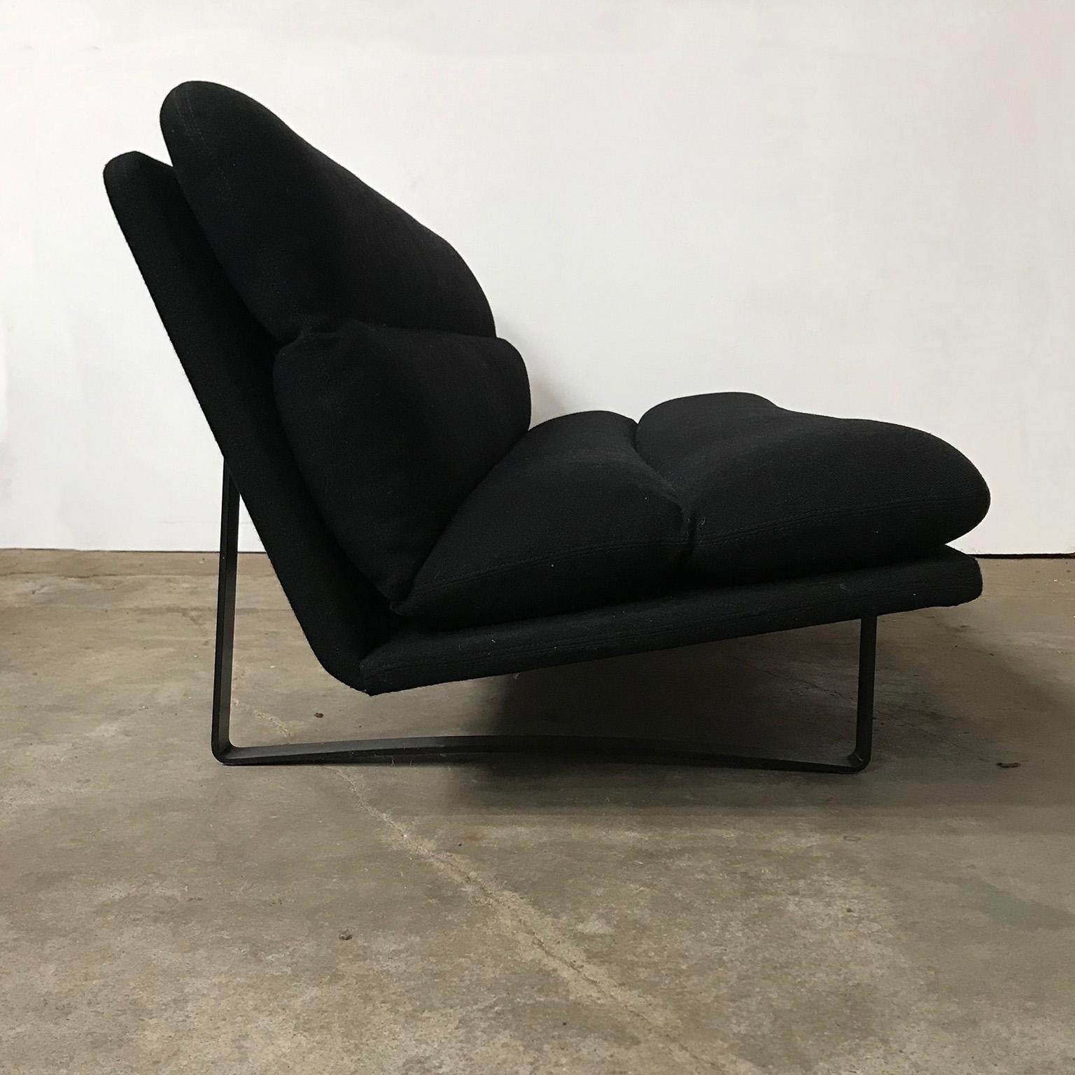 Original, early, stronger manufactured as nowadays, Kho Liang Ie 3-seat sofa in black fabric and black base. The upholstery shows traces of wear like some fading of color and some stains (#9) and some damage on one the corners (#13). The black base