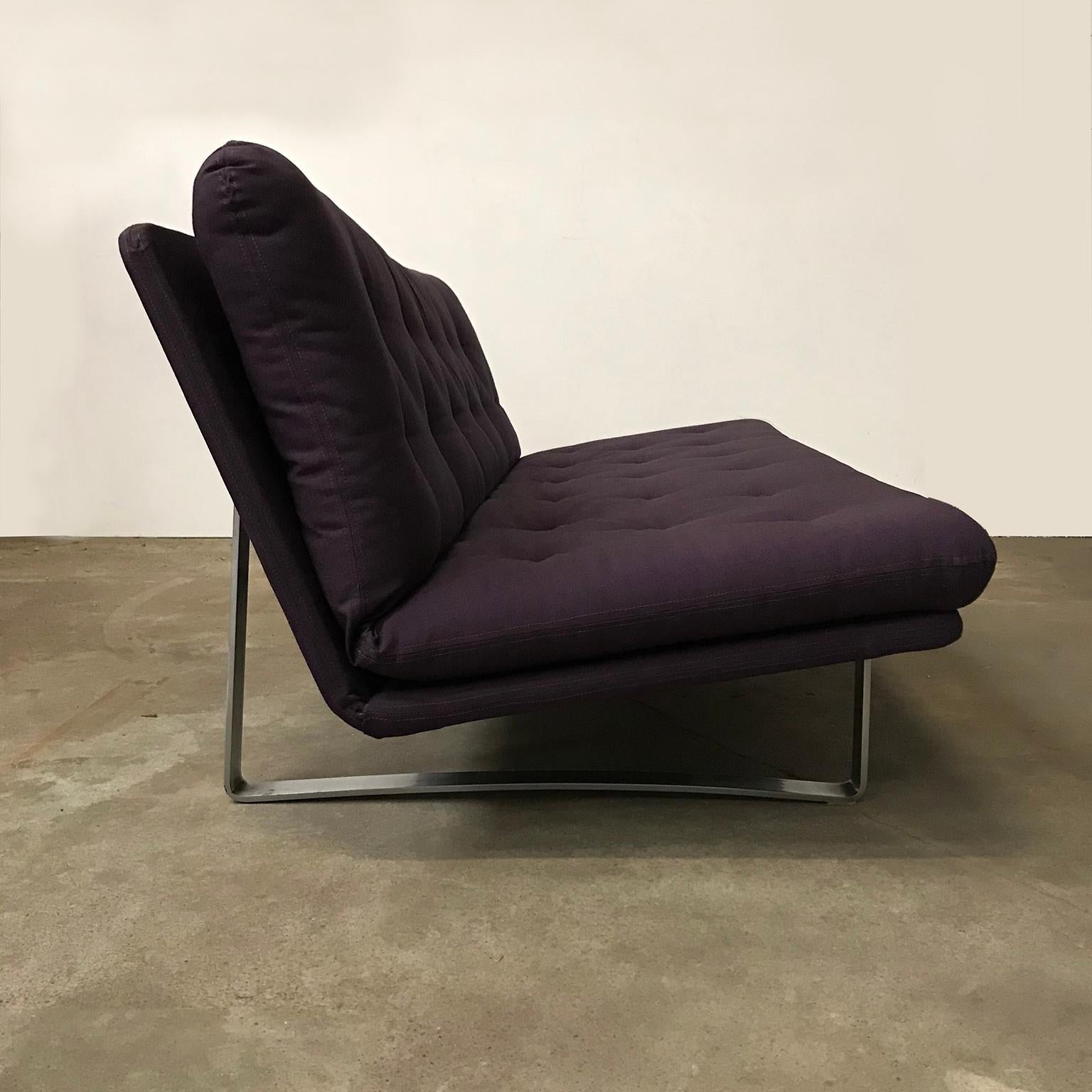 Please ask Casey Godrie Ibiza/Amsterdam for our competitive shipping quote.

Kho Liang Ie three-seat in purple. The sofa shows traces of wear but the upholstery is still very good. The upholstery is a beautiful wool that is easy to clean. Only some