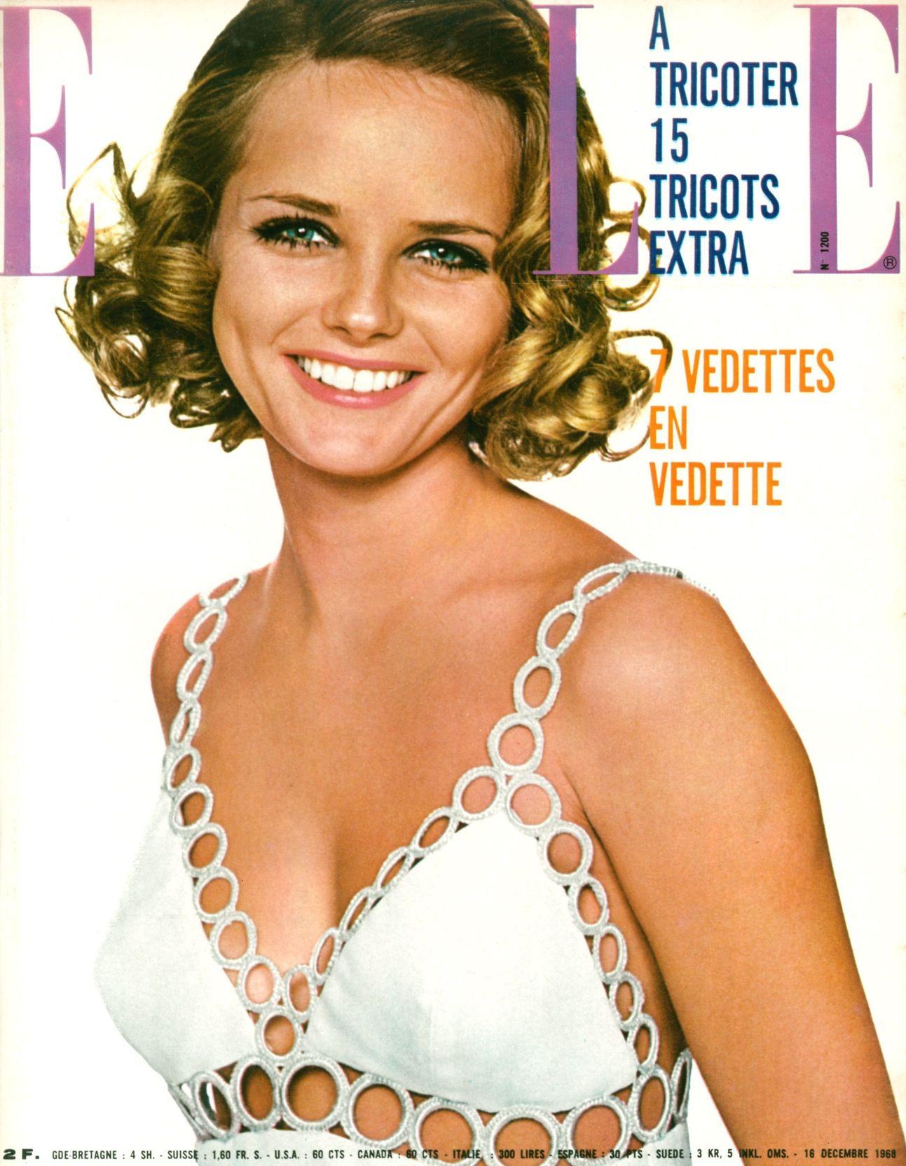 We are so thrilled to offer this ultra chic and incredible rare Loris Azzaro of Paris ivory silk crepe cut-out rings mod mini dress dating back to his iconic 1968 fall/winter collection. As shown, model Cheryl Tiegs wore the same Azzaro dress on the