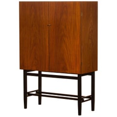 1968, Mahogany and Brass Dry Bar Cabinet High Black Skinny Legs by Förenade