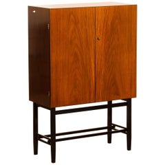 1968, Mahogany and Brass Dry Bar Cabinet High Black Skinny Legs by Förenade
