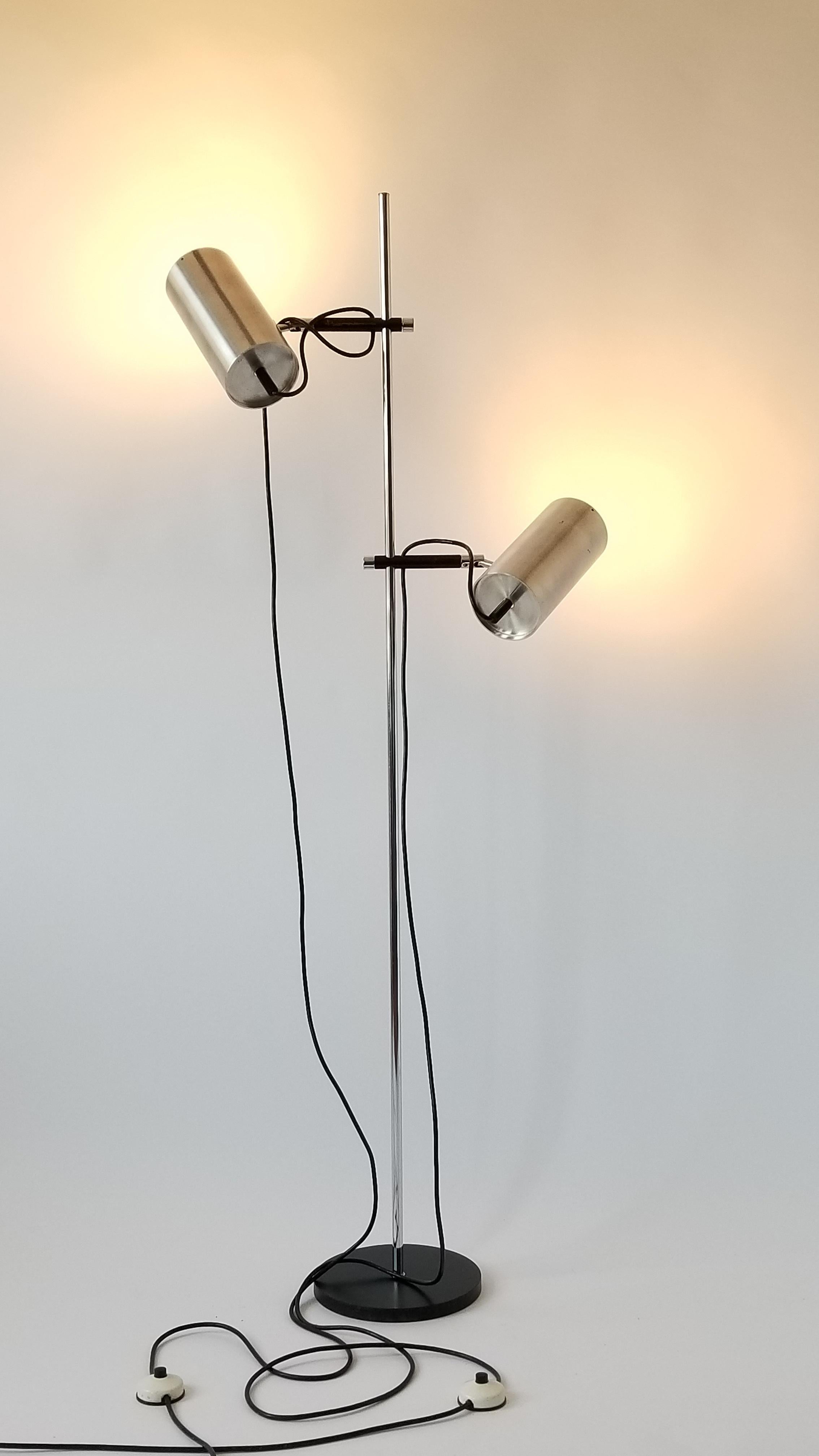 Rare twin shade floor lamp from Maria Pergay. 

Agile mechanism that permits any angle adjustment in a strong and sturdy manner.

Shade are made of stainless steel. They measure 9.5 inches high by 4.5 inches diameter.

The lockable branch that