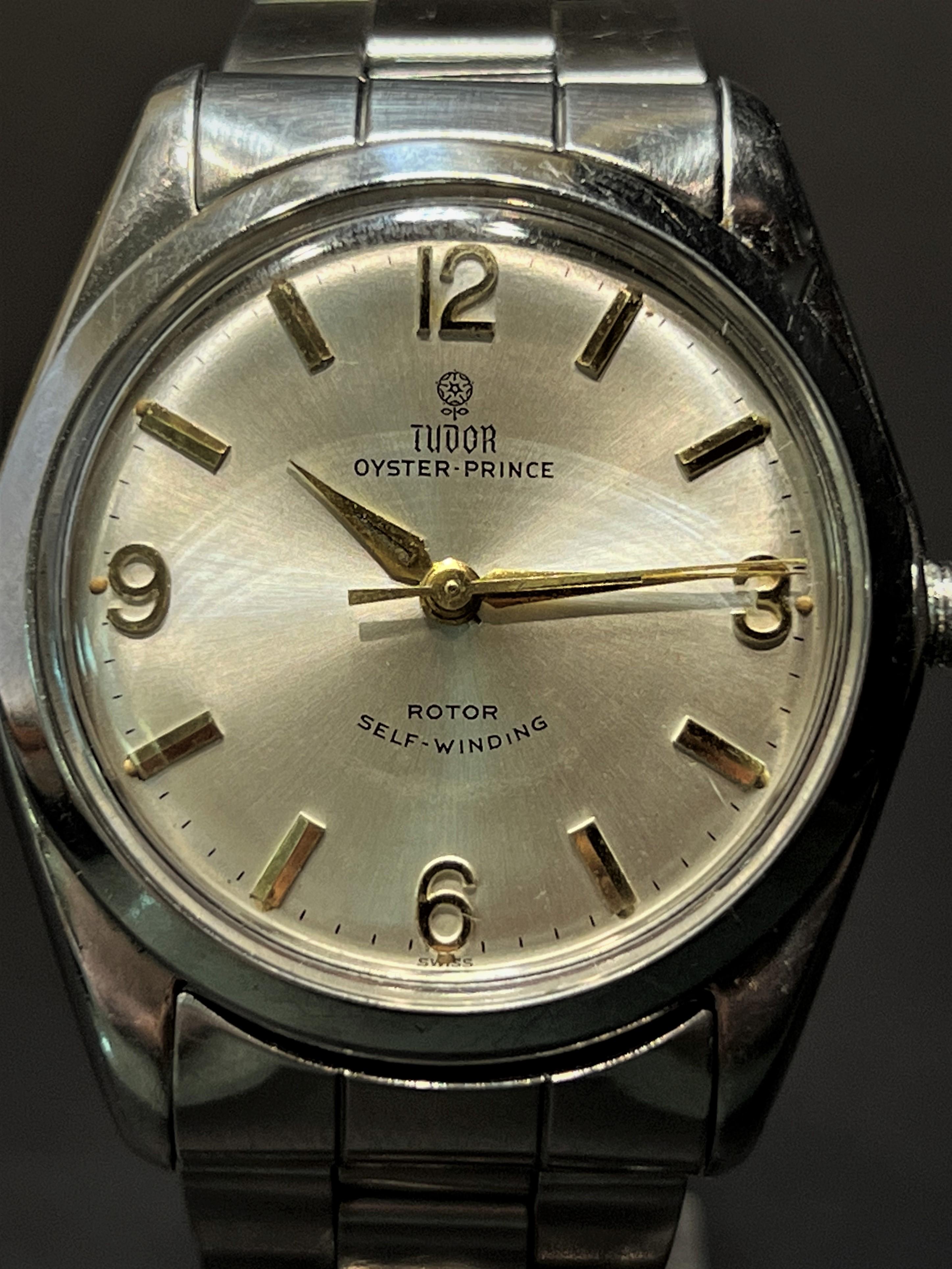 A guaranteed authentic vintage men’s Rolex Tudor Oyster-prince wristwatch. Serial number under band is 58XXXXX indicating the manufacture date of 1968. With its original Rolex period band. Crown will not screw down.

Size: The watch circumference is