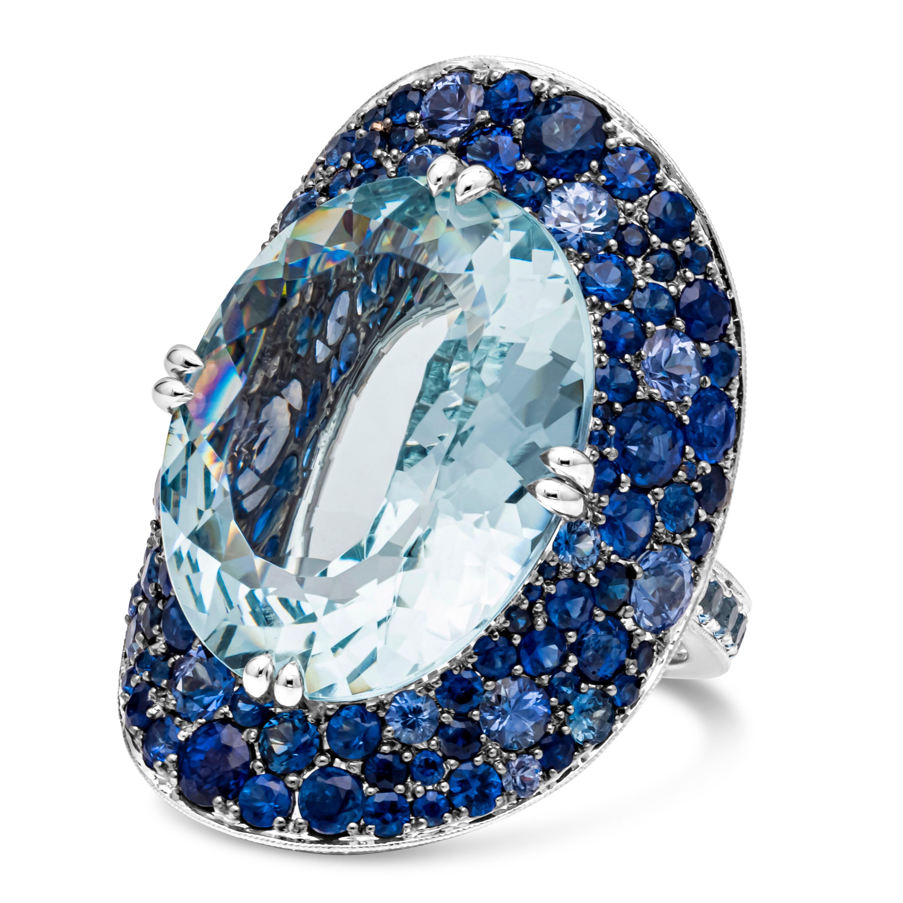 Contemporary 19.69 Carats Oval Cut Large Aquamarine with Sapphire and Diamond 'Bonnet' Ring For Sale