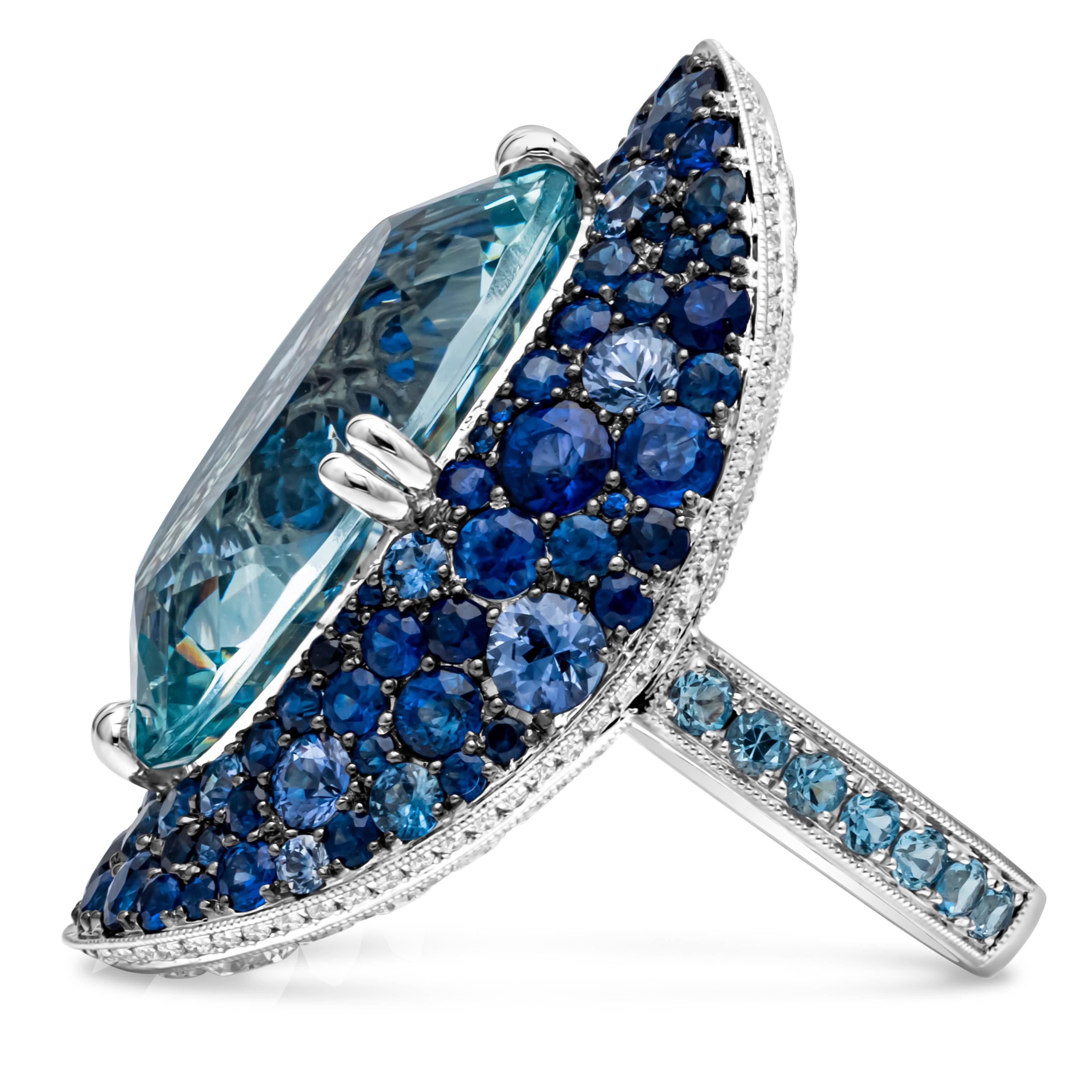 Contemporary 19.69 Carats Oval Cut Large Aquamarine with Sapphire and Diamond Bonnet Ring For Sale