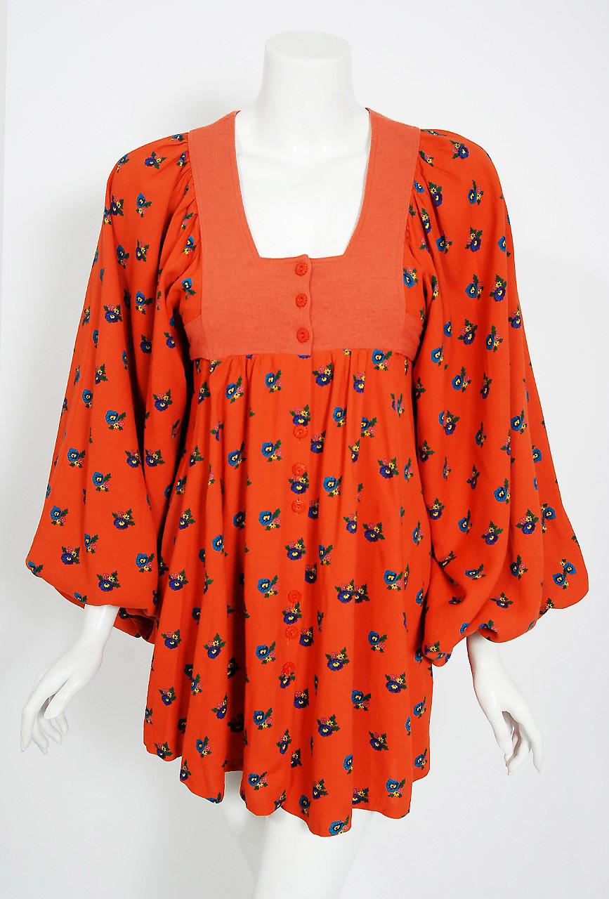 Stunning and extremely rare orange floral mini dress by the famous Jeff Banks British label. In 1964, Banks opened the boutique 'Clobber' in London and then launched his own fashion label is 1969. This adorable garment, dating back to one of his