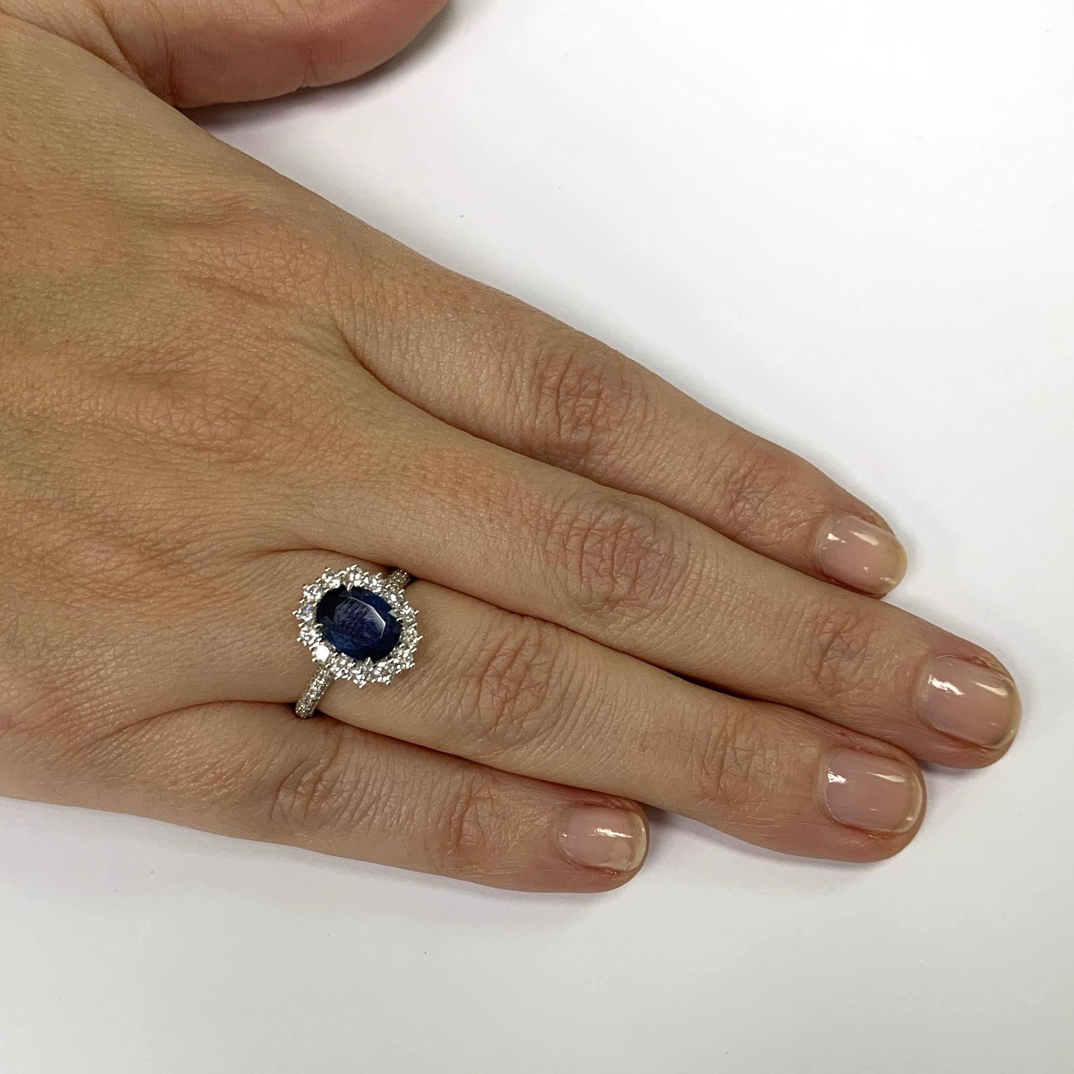 Oval Cut 1.96 Carat Blue Oval Sapphire Conflict Free Diamond Cocktail Halo Ring For Sale