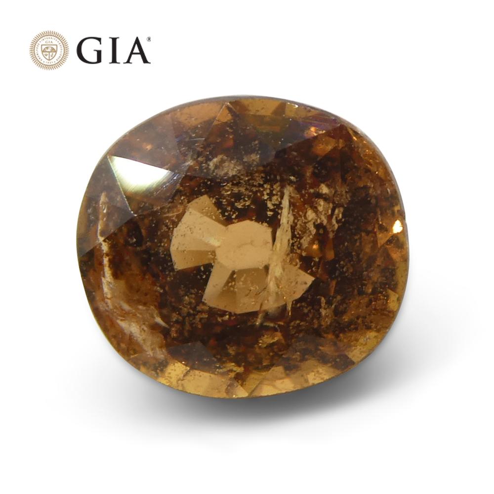 Women's or Men's 1.96ct Oval Brownish Pinkish Orange Sapphire GIA Certified Madagascar   For Sale