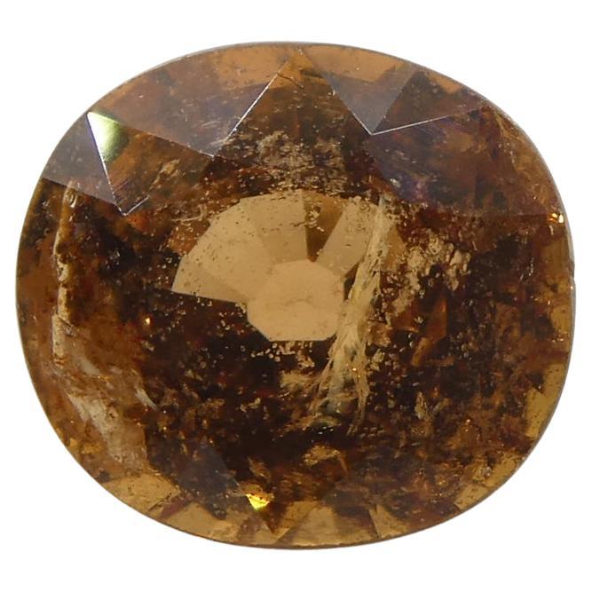 Saphir ovale brunâtre roseâtre orange certifié GIA de Madagascar, 1,96 carat  