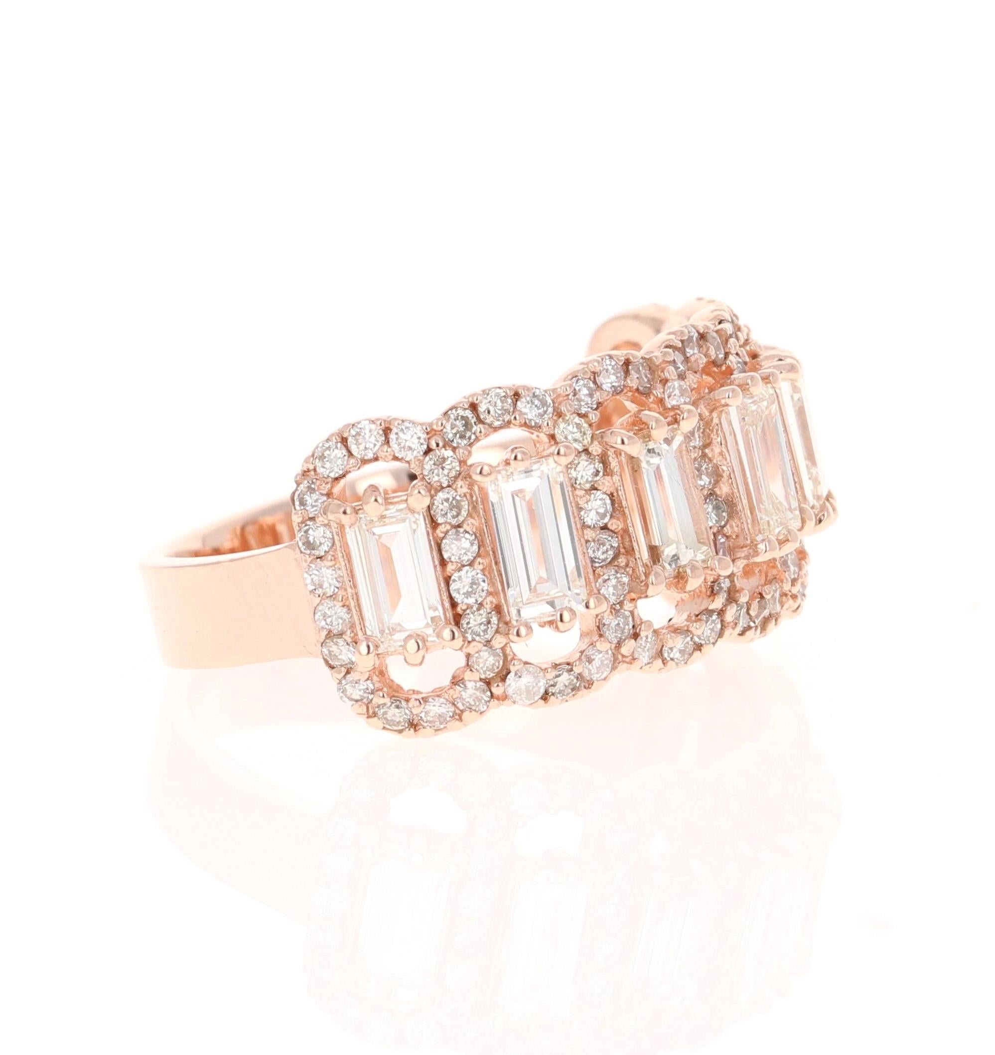 This ring has 7 straight Baguette Cut Diamonds that weigh 1.27 Carats and is embellished with 96 Round Cut Diamonds that weigh 0.70 Carats.  The clarity and color of the diamonds are VS-H.

Crafted in 14 Karat Rose Gold and weighs approximately 5.5