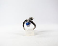 1.97 Carat Blue Sapphire 1.36 Carat White Black Diamond White Gold "Snake" Ring