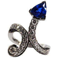1.97 Carat Blue Sapphire 1.36 Carat White Black Diamond White Gold "Snake" Ring