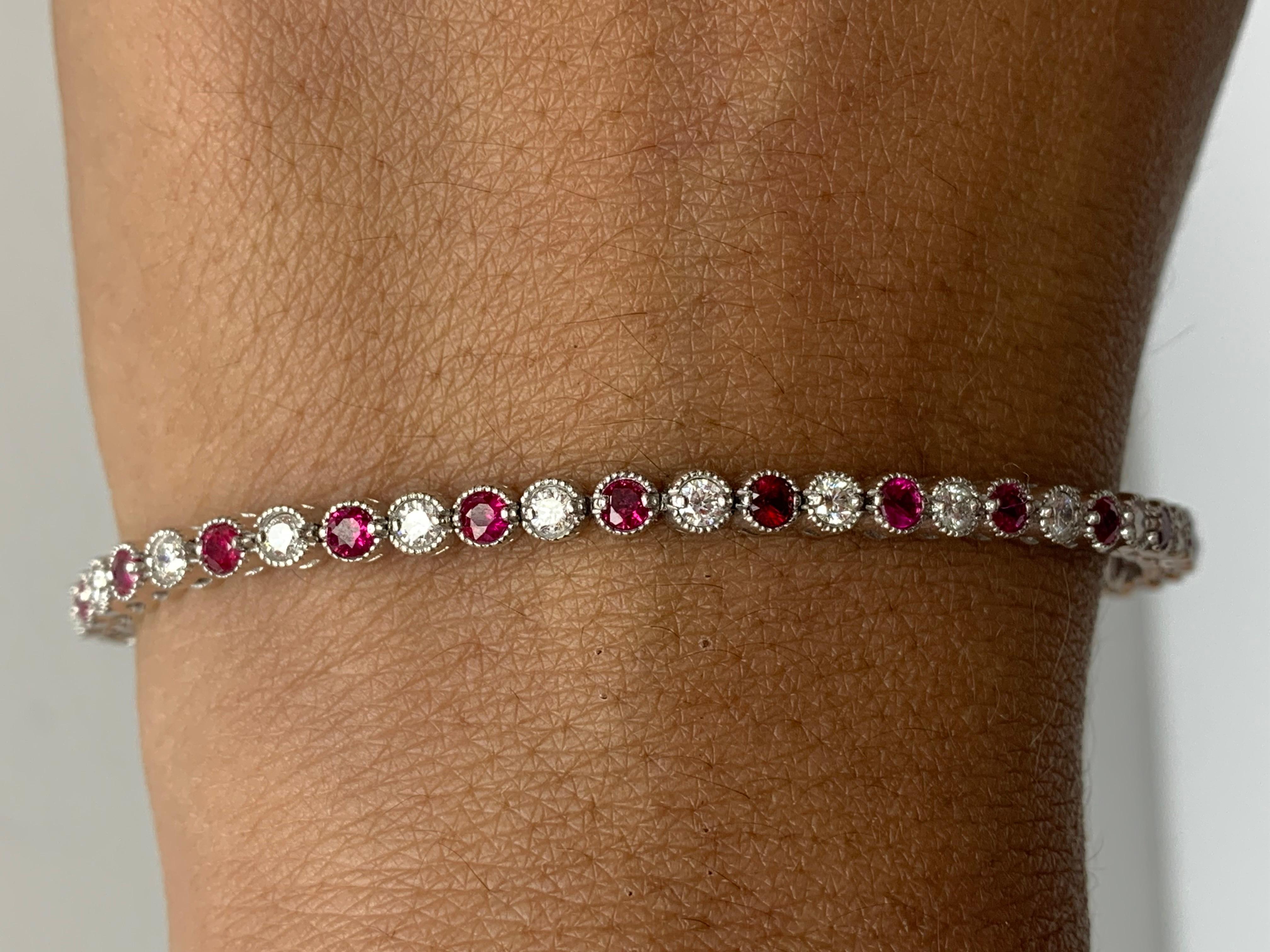 A classic tennis bracelet style showcasing a row of 26 round brilliant diamonds set alternately with 26 lush red Rubies in a polished 14k rose gold mounting.  Diamonds weigh 1.30 carats total and rubies weigh 1.97 carats total.

Style is available